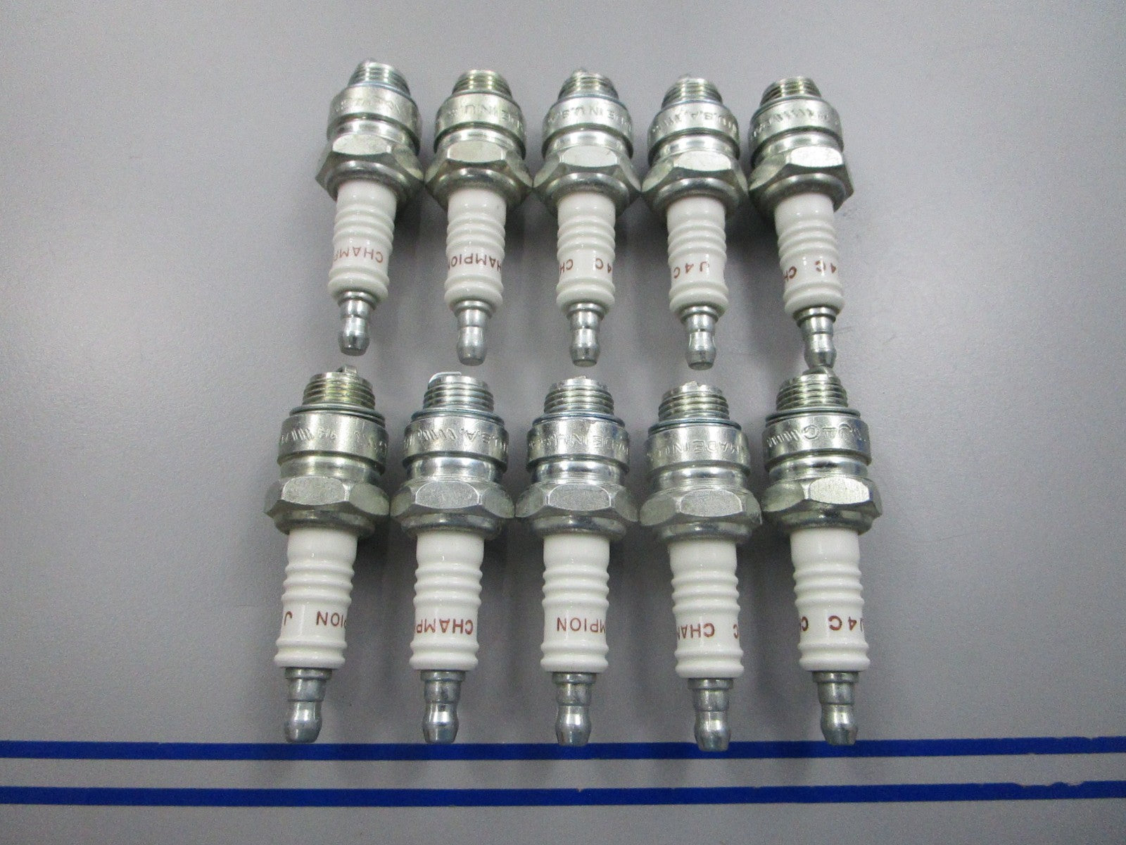 NEW (LOT OF 10) J4C Champion Spark Plug 0810