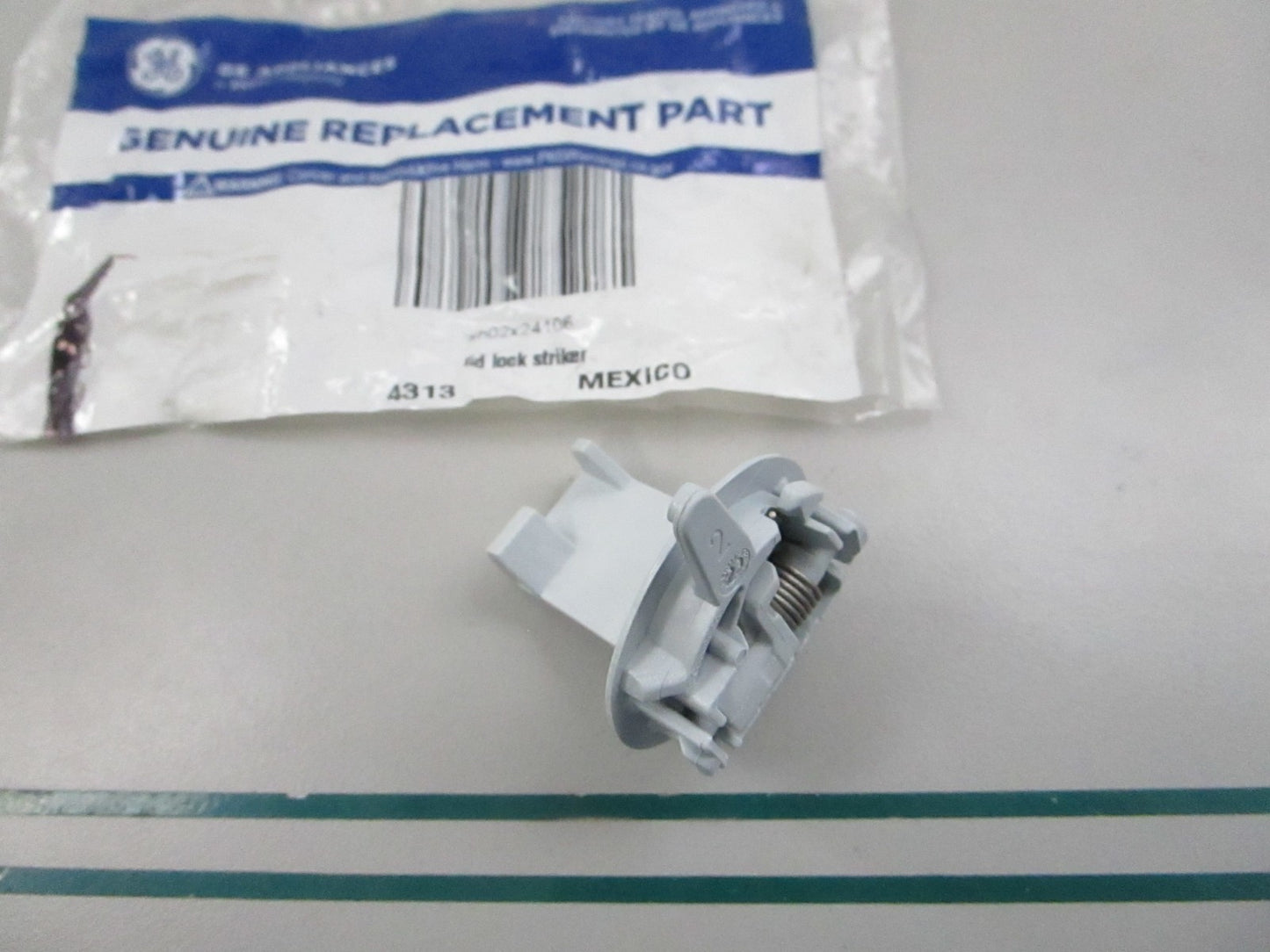 NEW OEM WH02X24106 GE Lid Lock Striker 0810