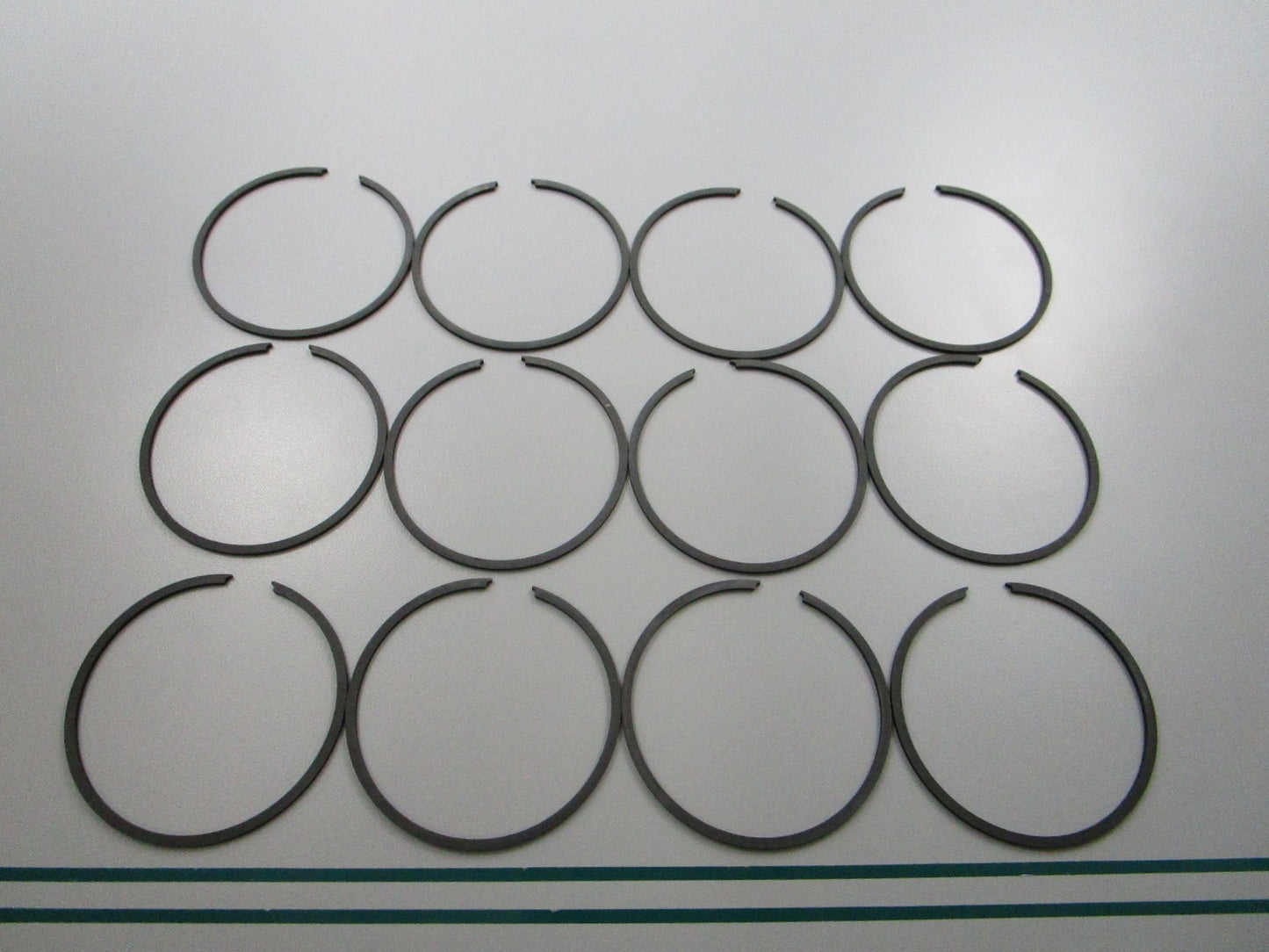 NEW OEM 39-87261A12 Mercury Quicksilver 12 Piston Ring Set 0810
