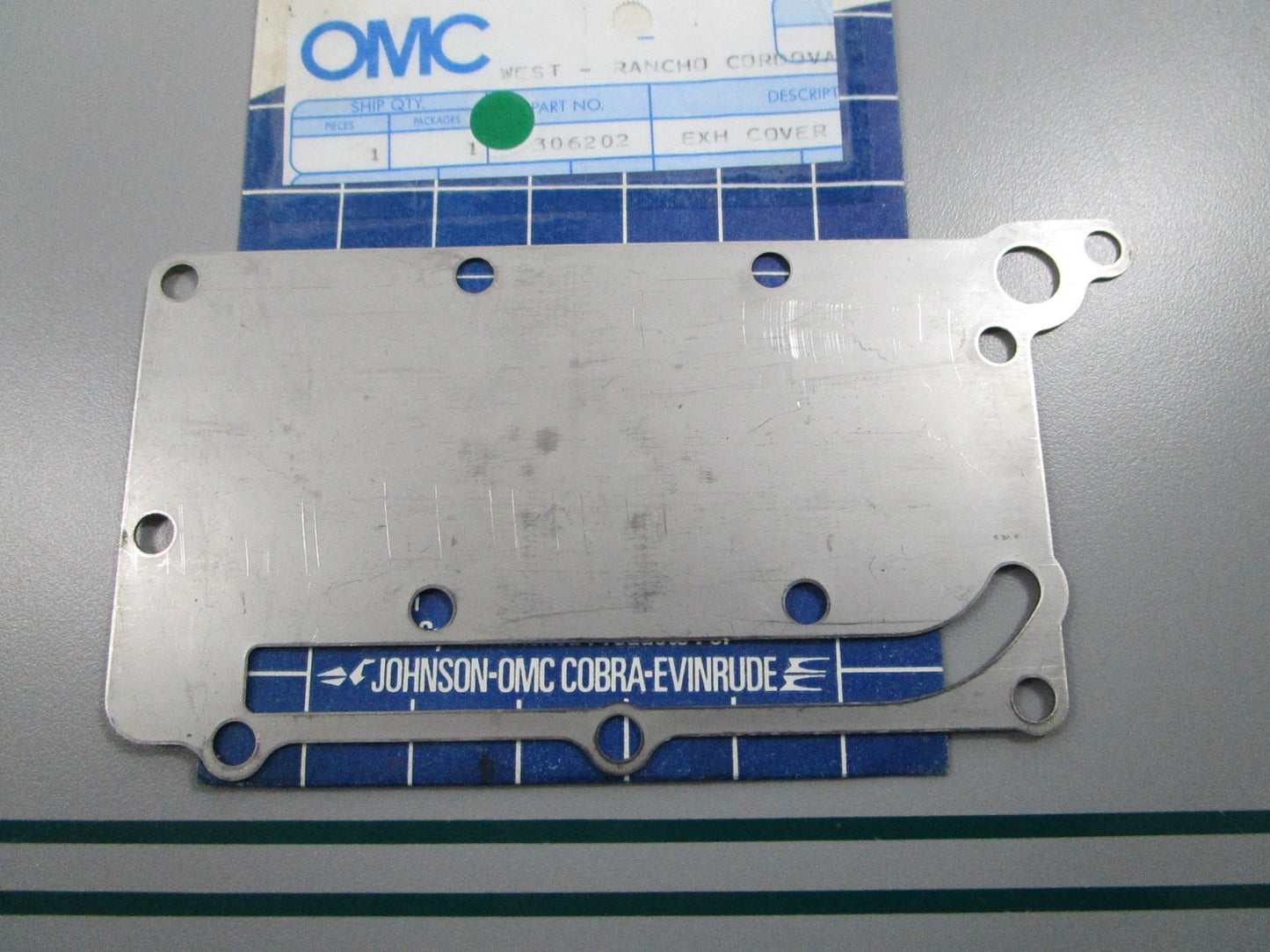 NEW OEM 306202 0306202 OMC Johnson Evinrude Exhaust Cover 0810
