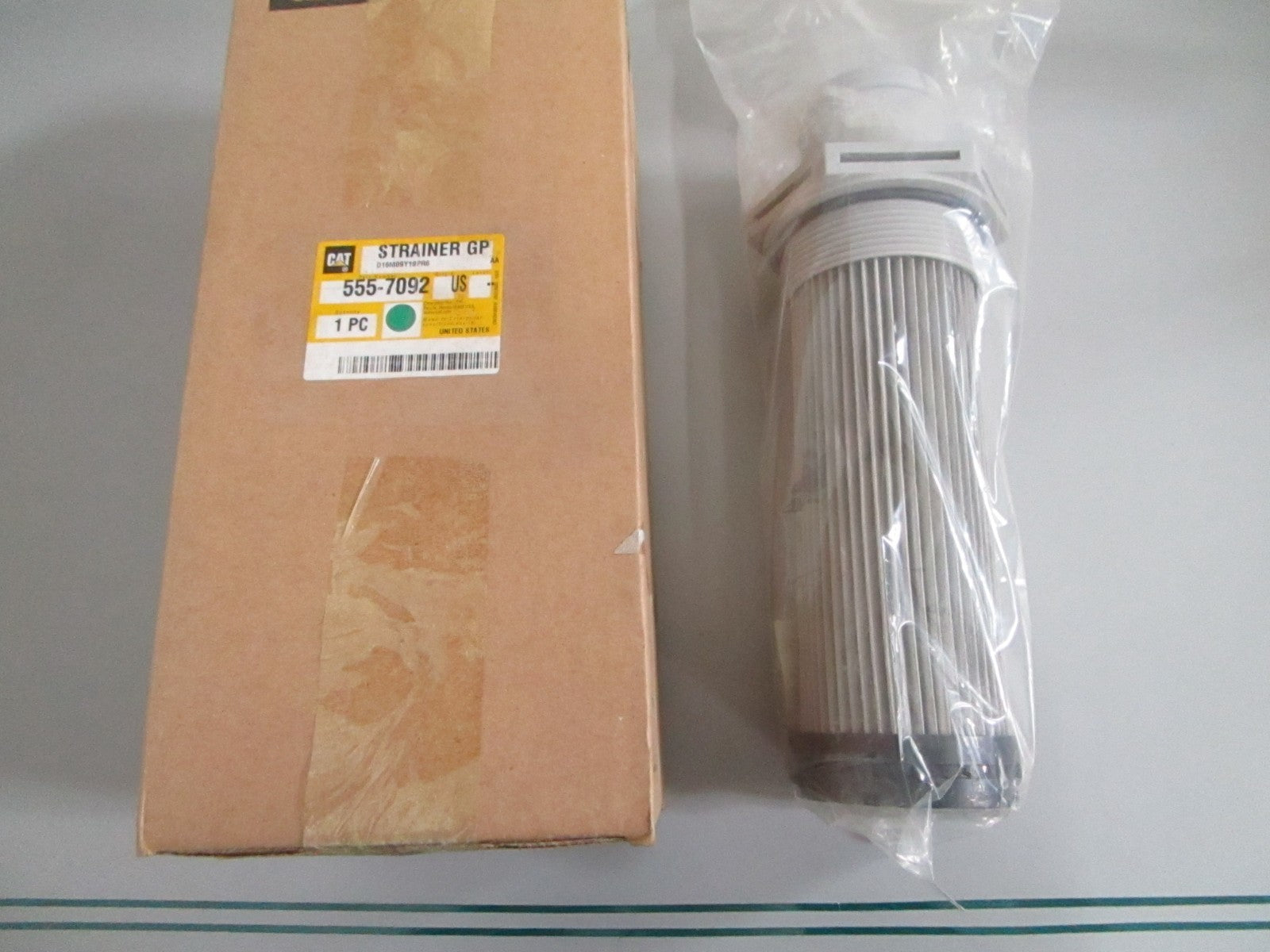 Caterpillar 555-7092 NEW OEM Strainer CAT Heavy Equipment Genuine Factory 0820