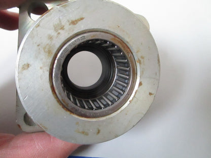 NEW OEM 317882 385556 OMC Johnson Evinrude Bearing Housing & Seal 0720
