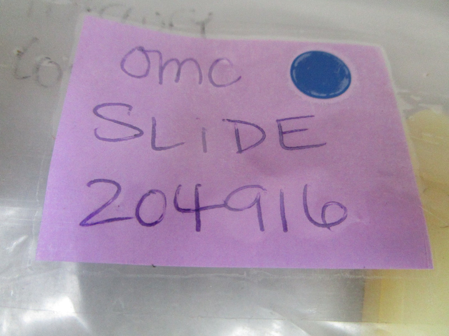 NEW OEM 204916 0204916 OMC Johnson Evinrude Slide 0810