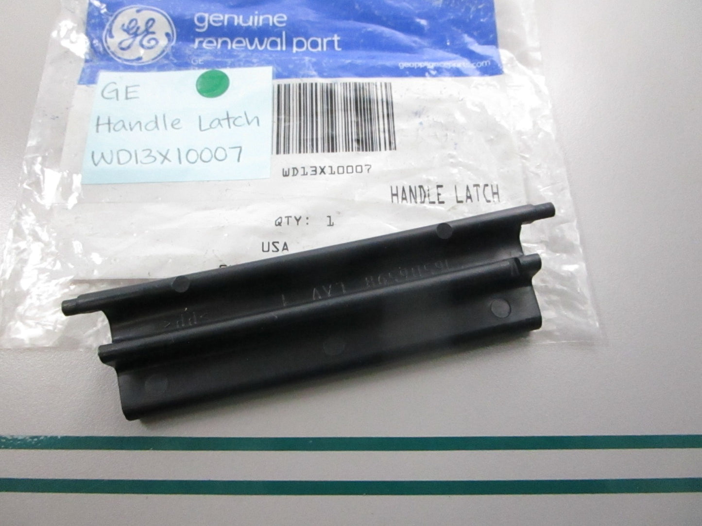 NEW OEM WD13X10007 GE Handle Latch 0810