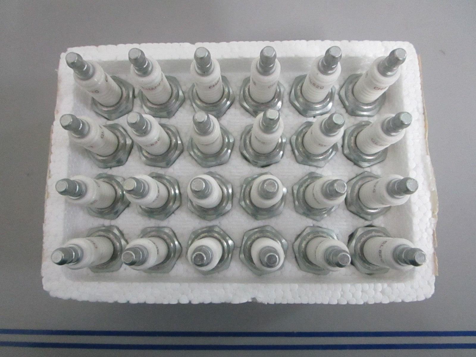 NEW OEM (LOT OF 24) QL82C Champion Spark Plug 0820