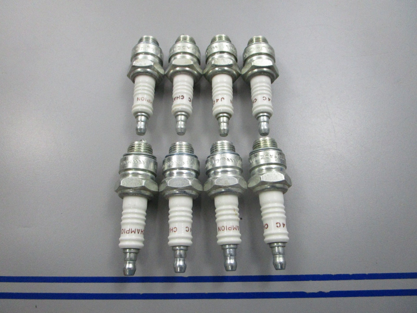 NEW (LOT OF 8) J4C Champion Spark Plug 0810