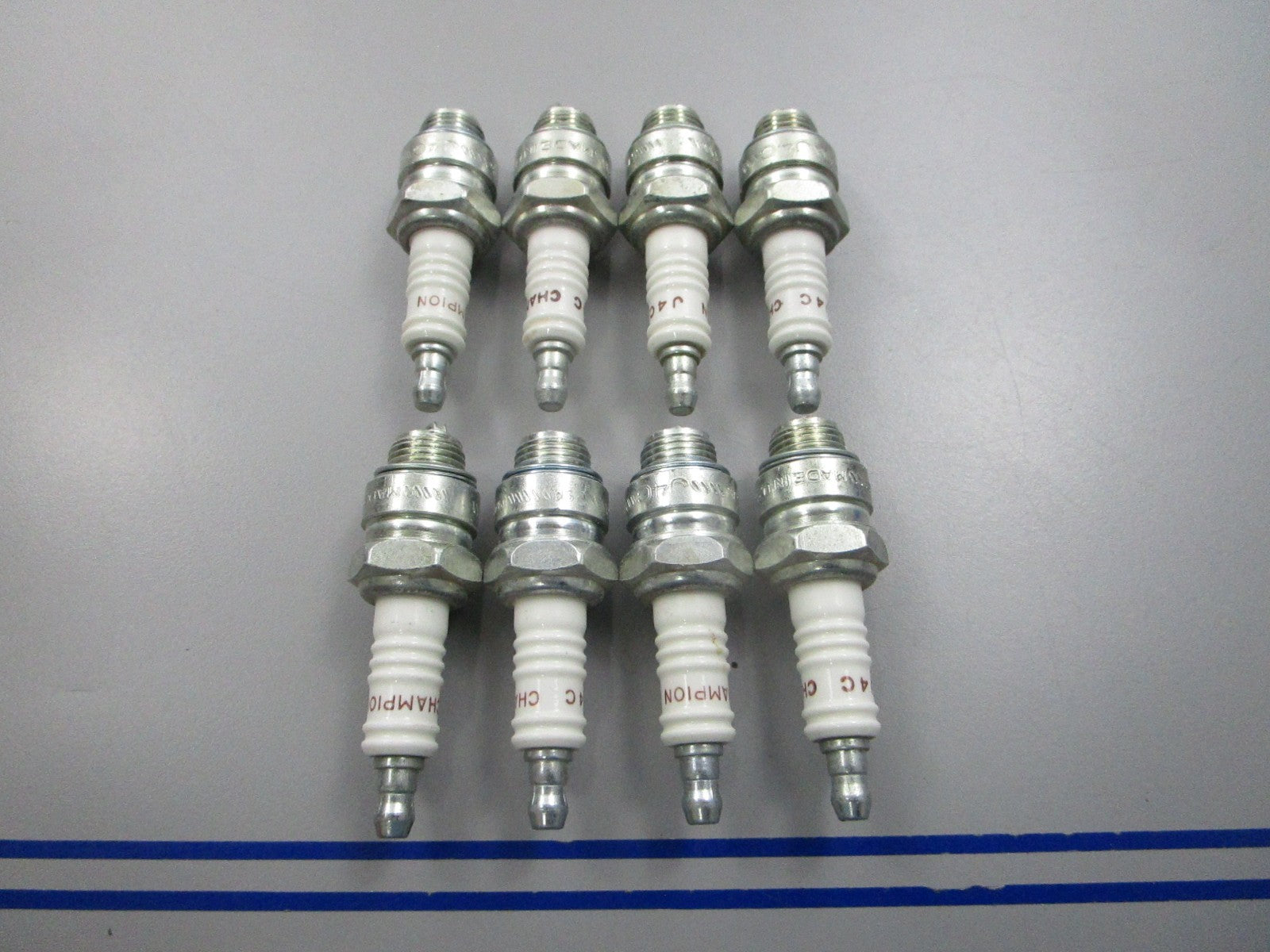 NEW (LOT OF 8) J4C Champion Spark Plug 0810