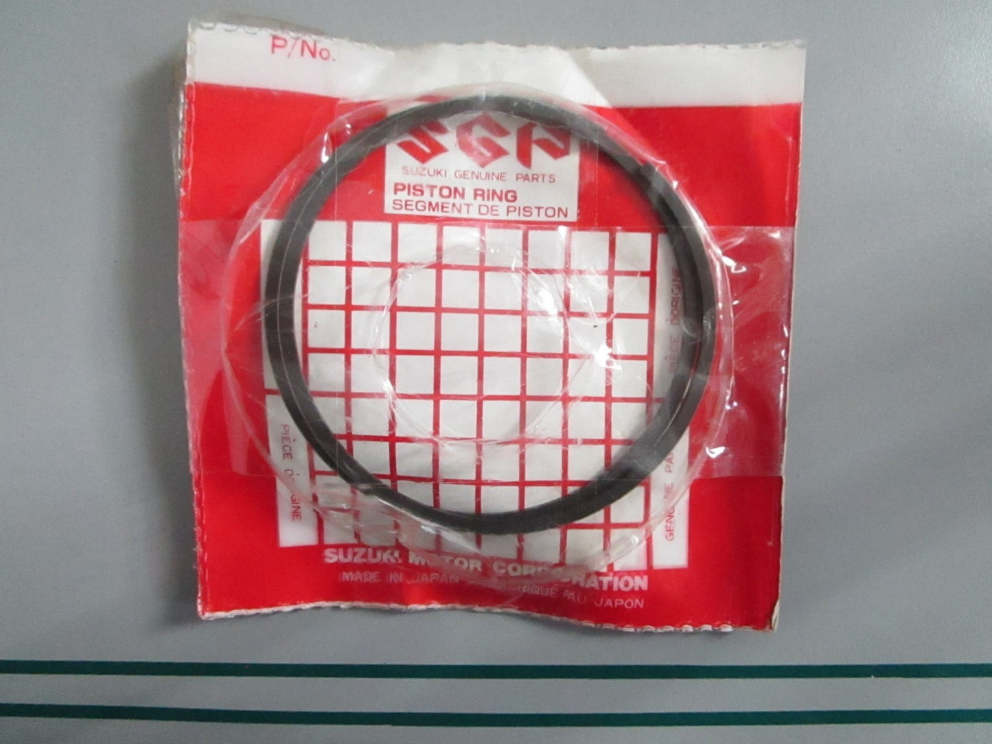 NEW OEM 12140-94400-050 Suzuki Piston Ring Set 0820