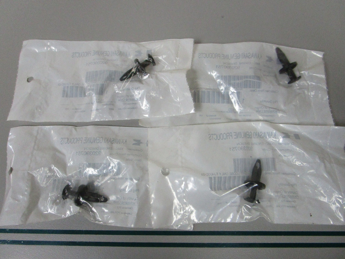 NEW OEM (LOT OF 4) 920390751 Kawasaki Rivet Guard 0810