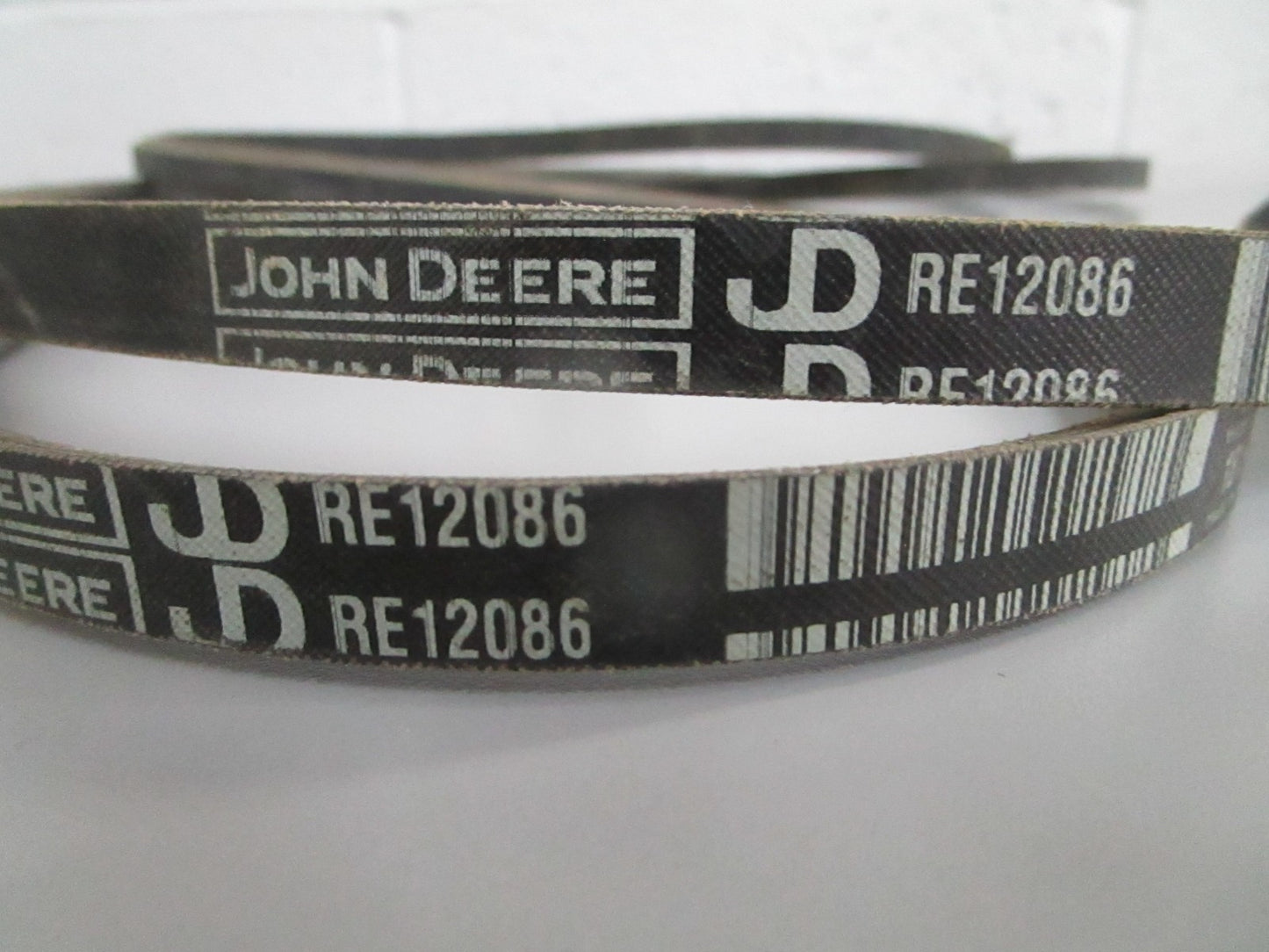 NEW OEM RE12086 John Deere Belt Set 0820