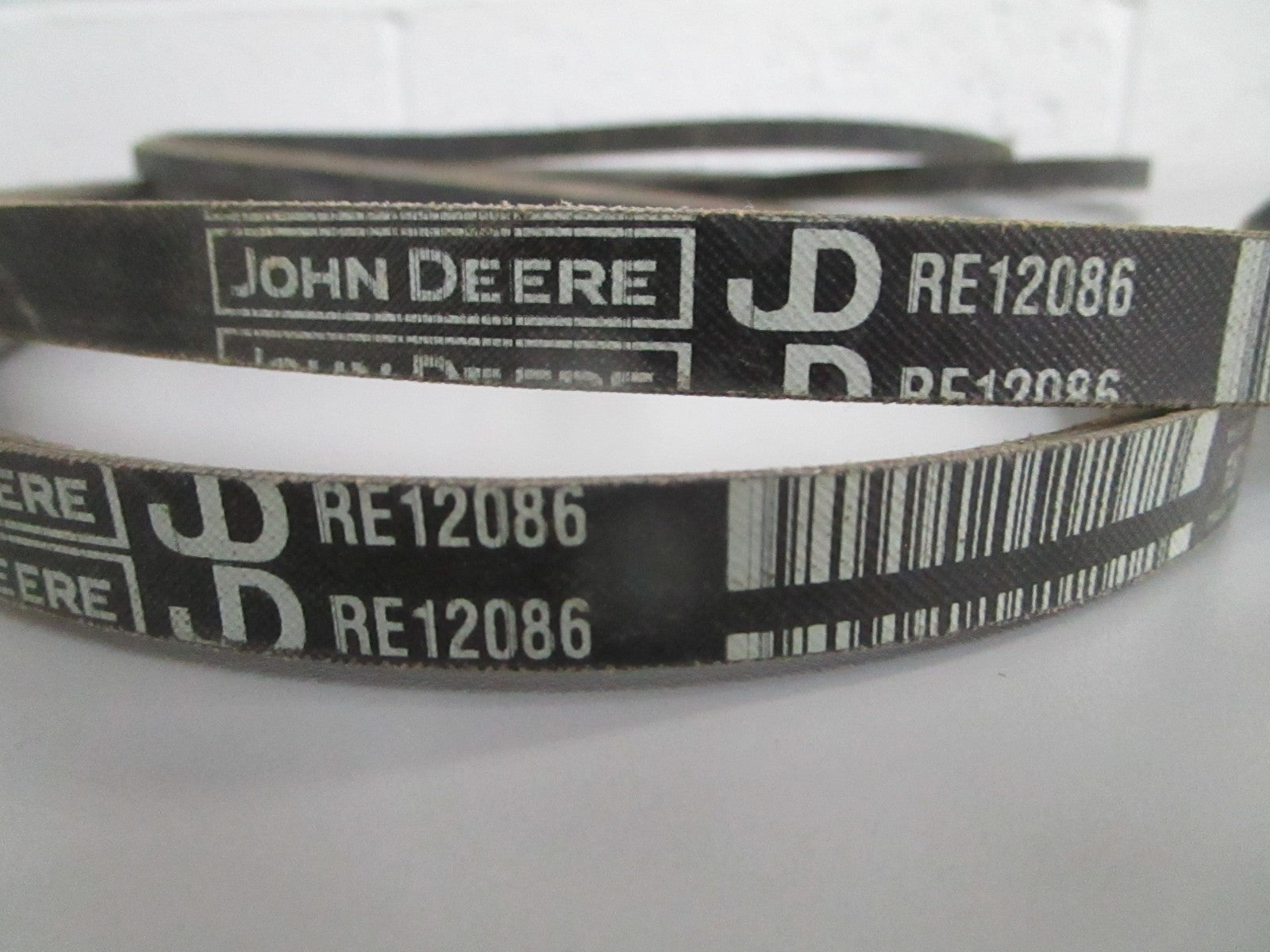 NEW OEM RE12086 John Deere Belt Set 0820