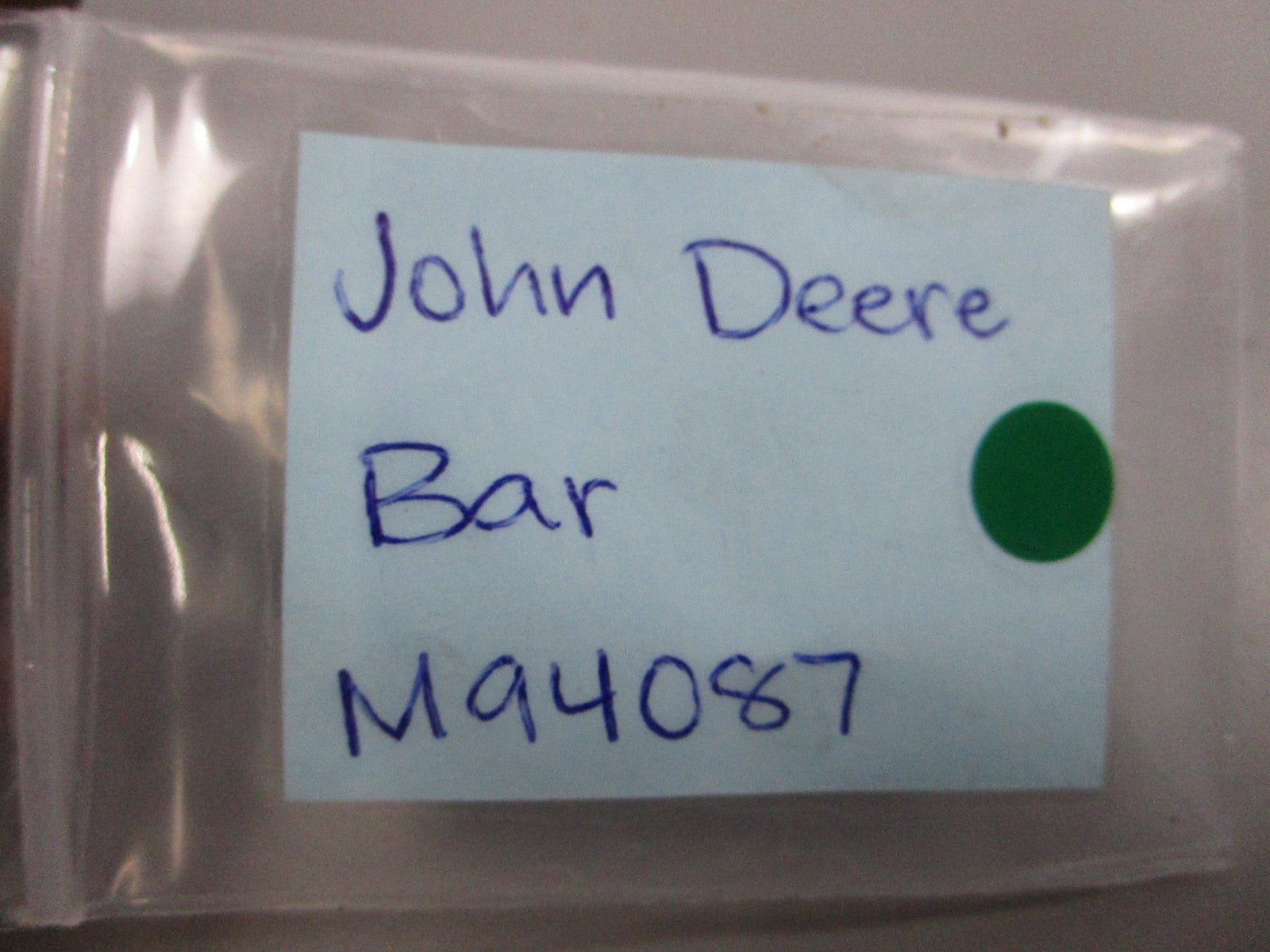 NEW OEM M94087 John Deere Bar 0810