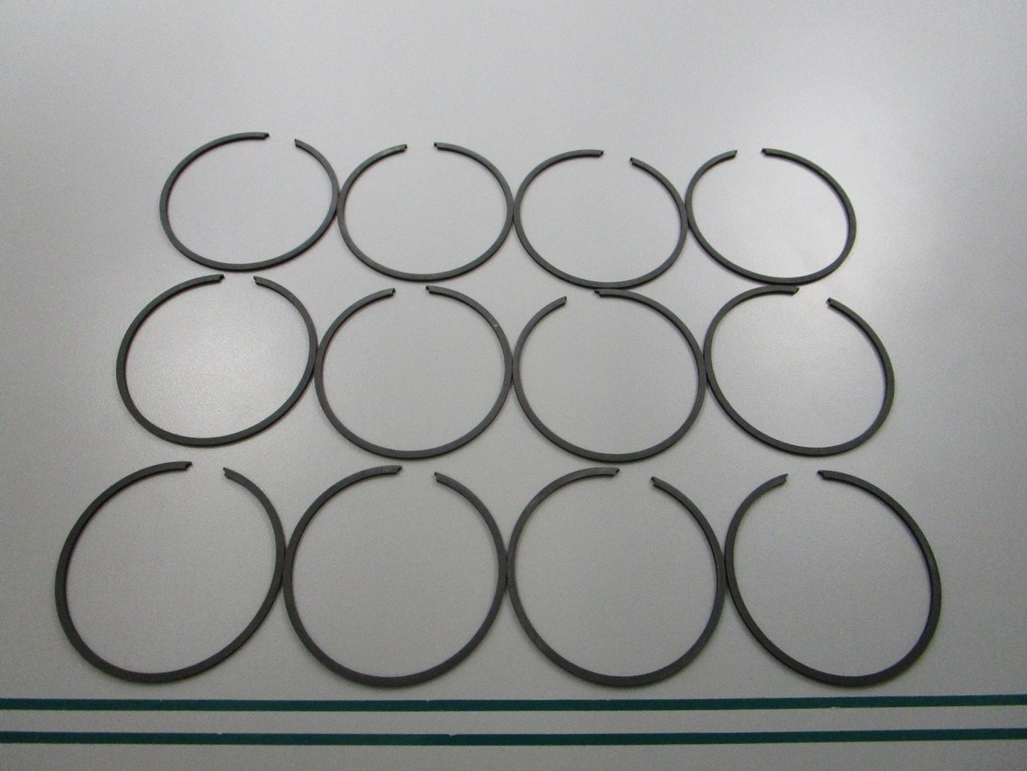 NEW OEM 39-87261A12 Mercury Quicksilver 12 Piston Ring Set 0810