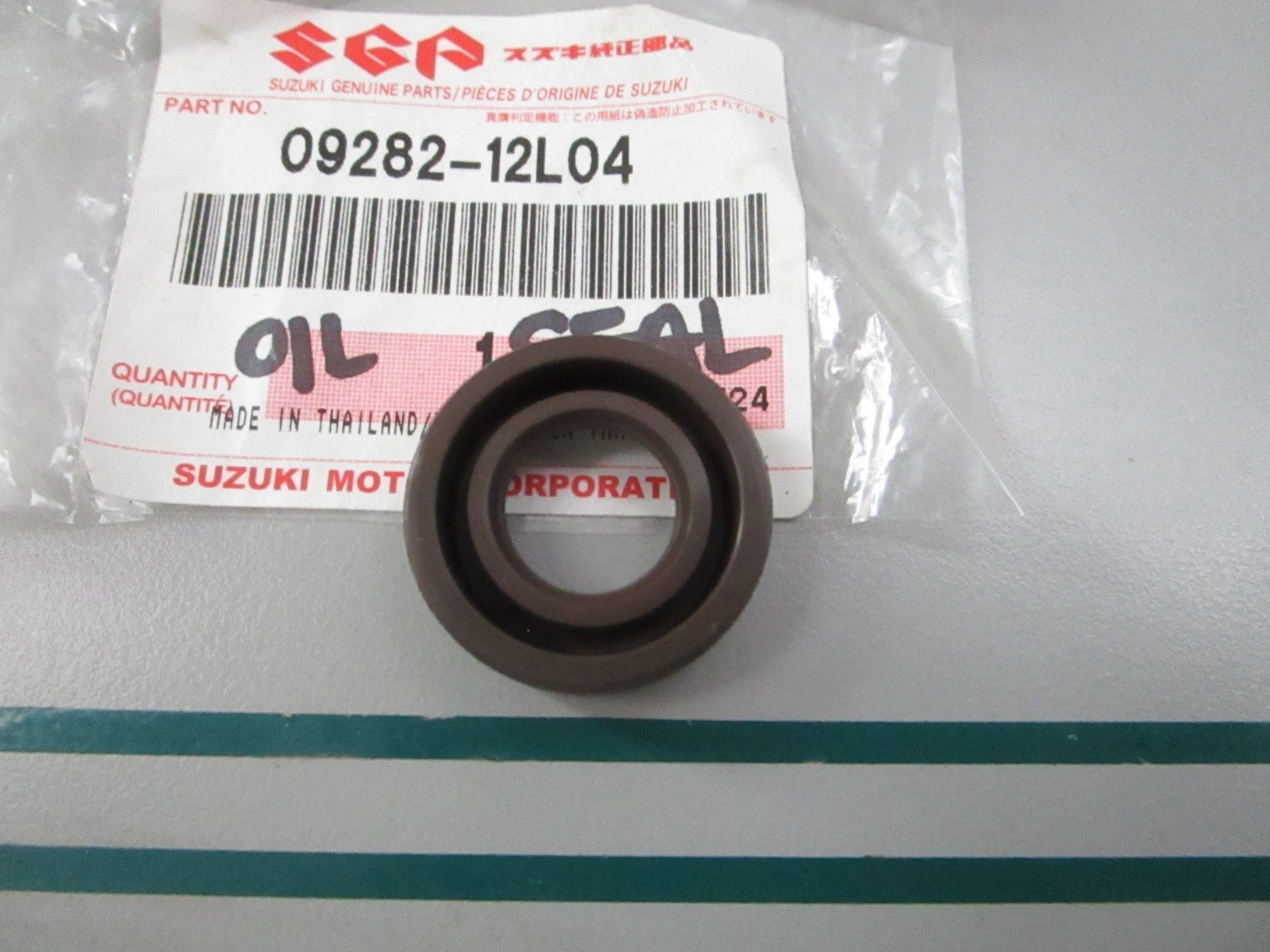 NEW OEM 09282-12L04 Suzuki Oil Seal 0810