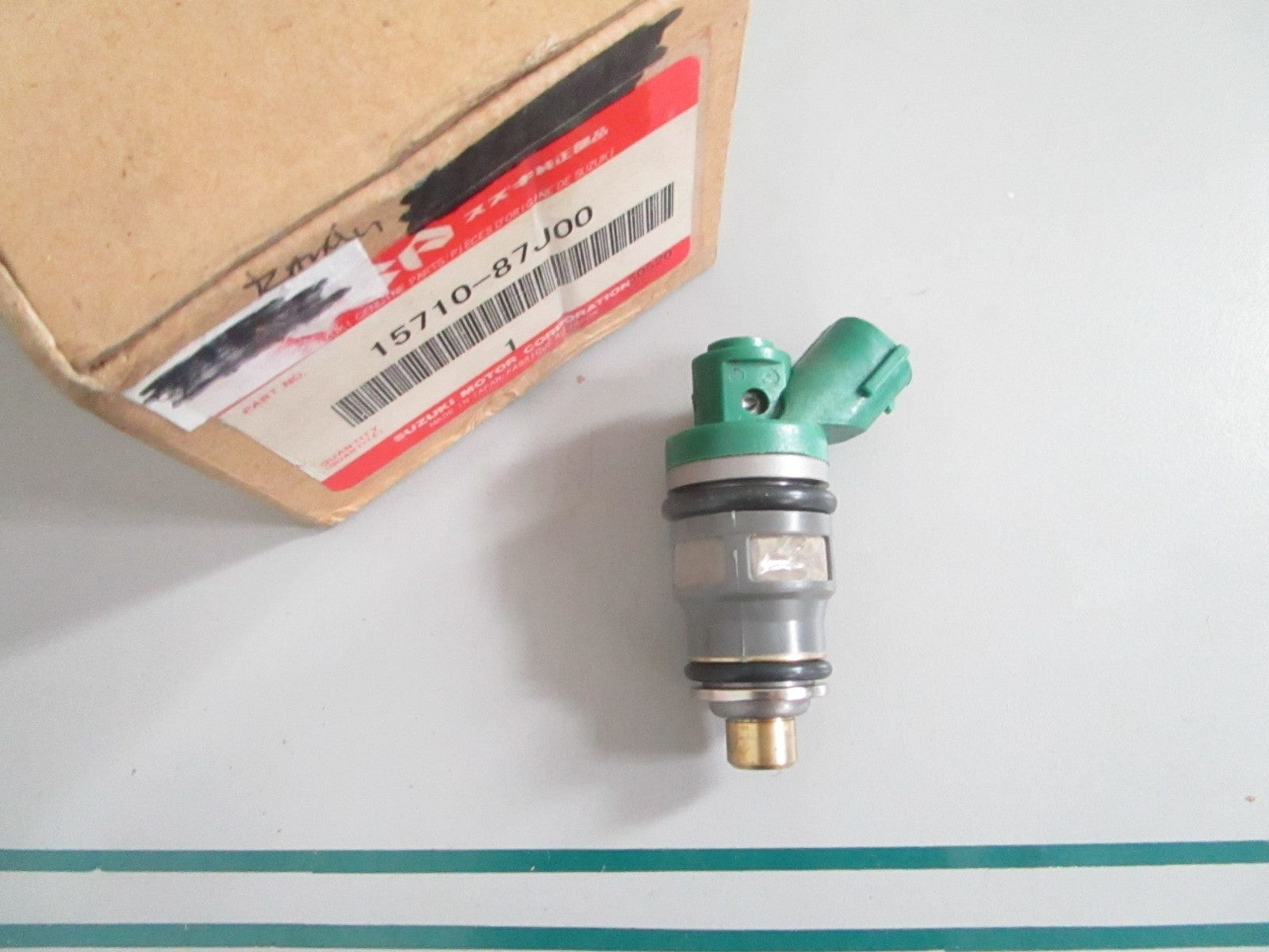 NEW OEM 15710-87J00 Suzuki Fuel Injector Assy 0820