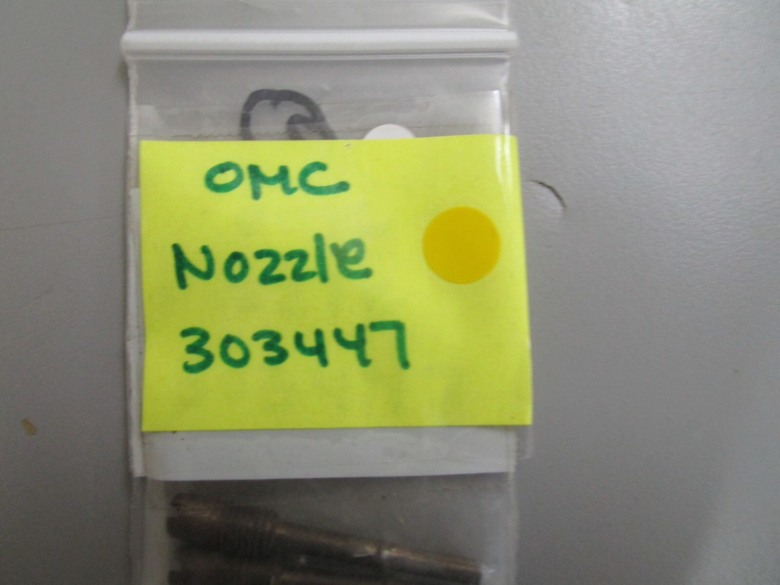 *NEW OEM* 0810 OMC Johnson Evinrude Nozzle 303447 0303447