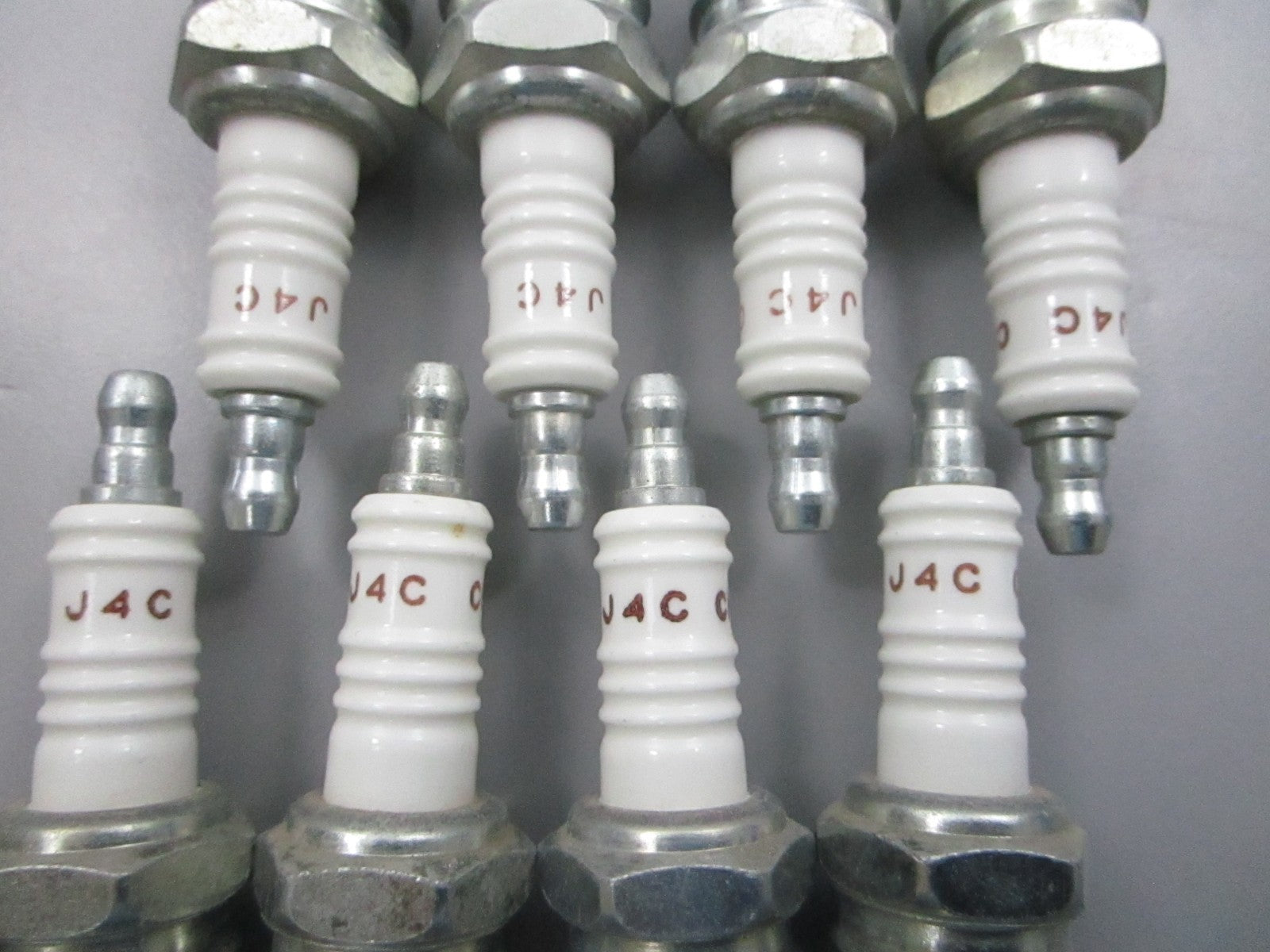 NEW (LOT OF 8) J4C Champion Spark Plug 0810
