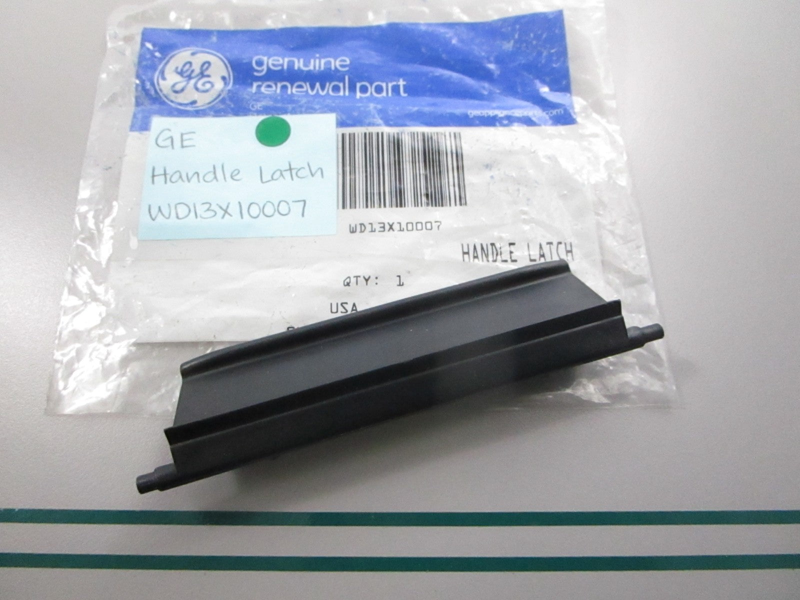 NEW OEM WD13X10007 GE Handle Latch 0810