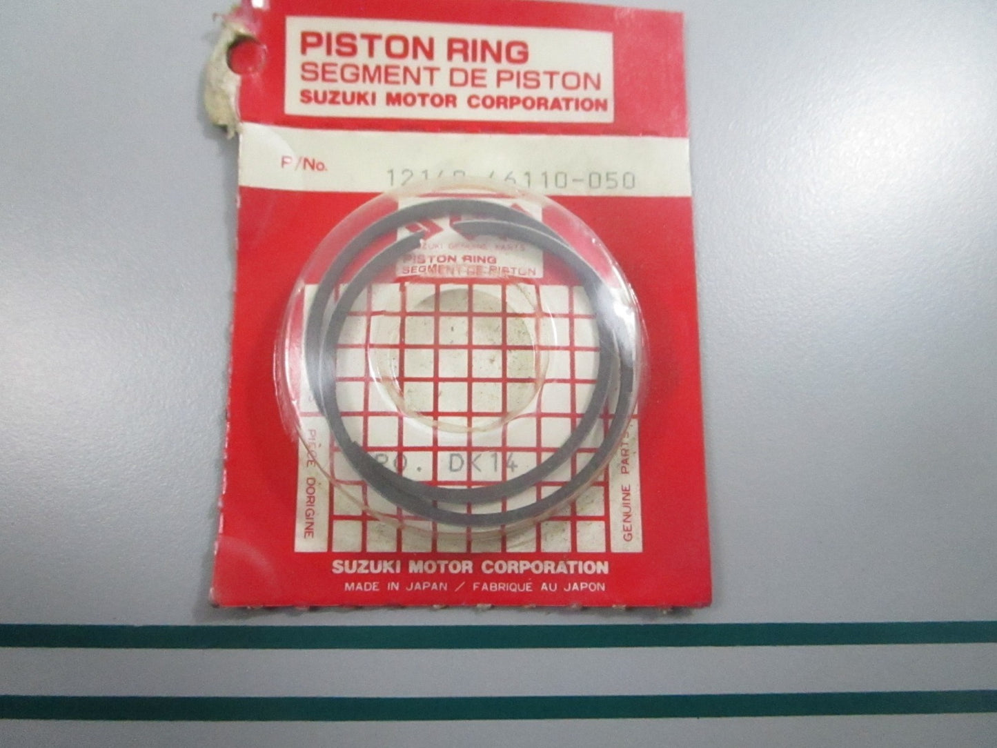 NEW OEM 12140-46110-050 Suzuki Piston Ring Set 0810