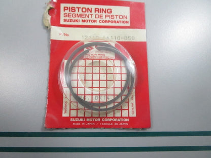 NEW OEM 12140-46110-050 Suzuki Piston Ring Set 0810