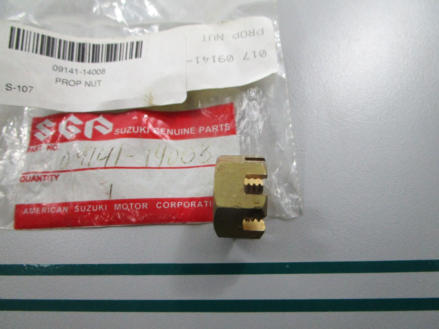 NEW OEM 09141-14008 Suzuki Propeller Nut 0810