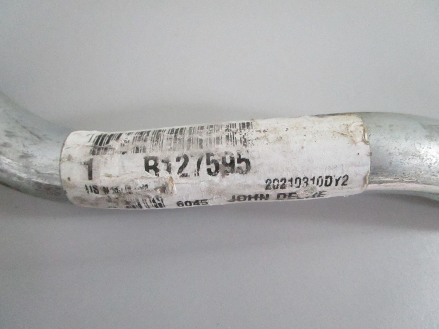 NEW OEM R127595 John Deere Water Bypass Tube 0820