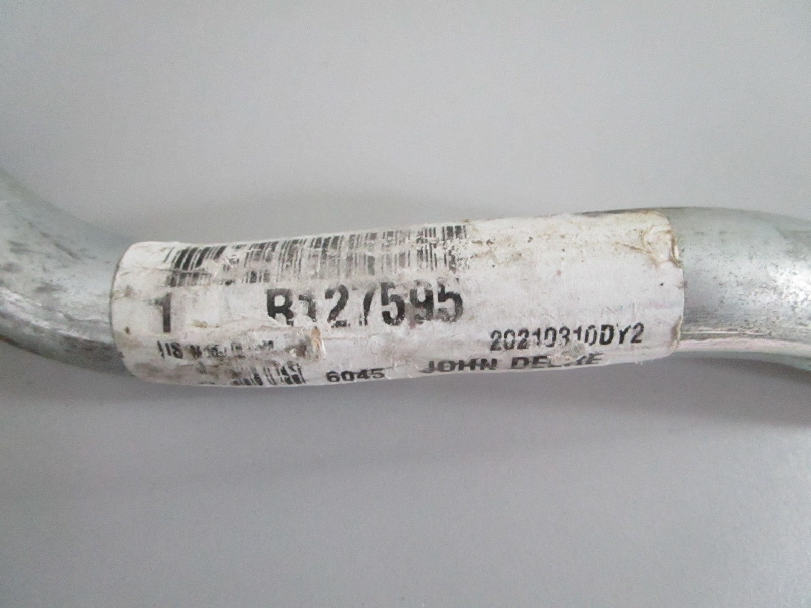 NEW OEM R127595 John Deere Water Bypass Tube 0820