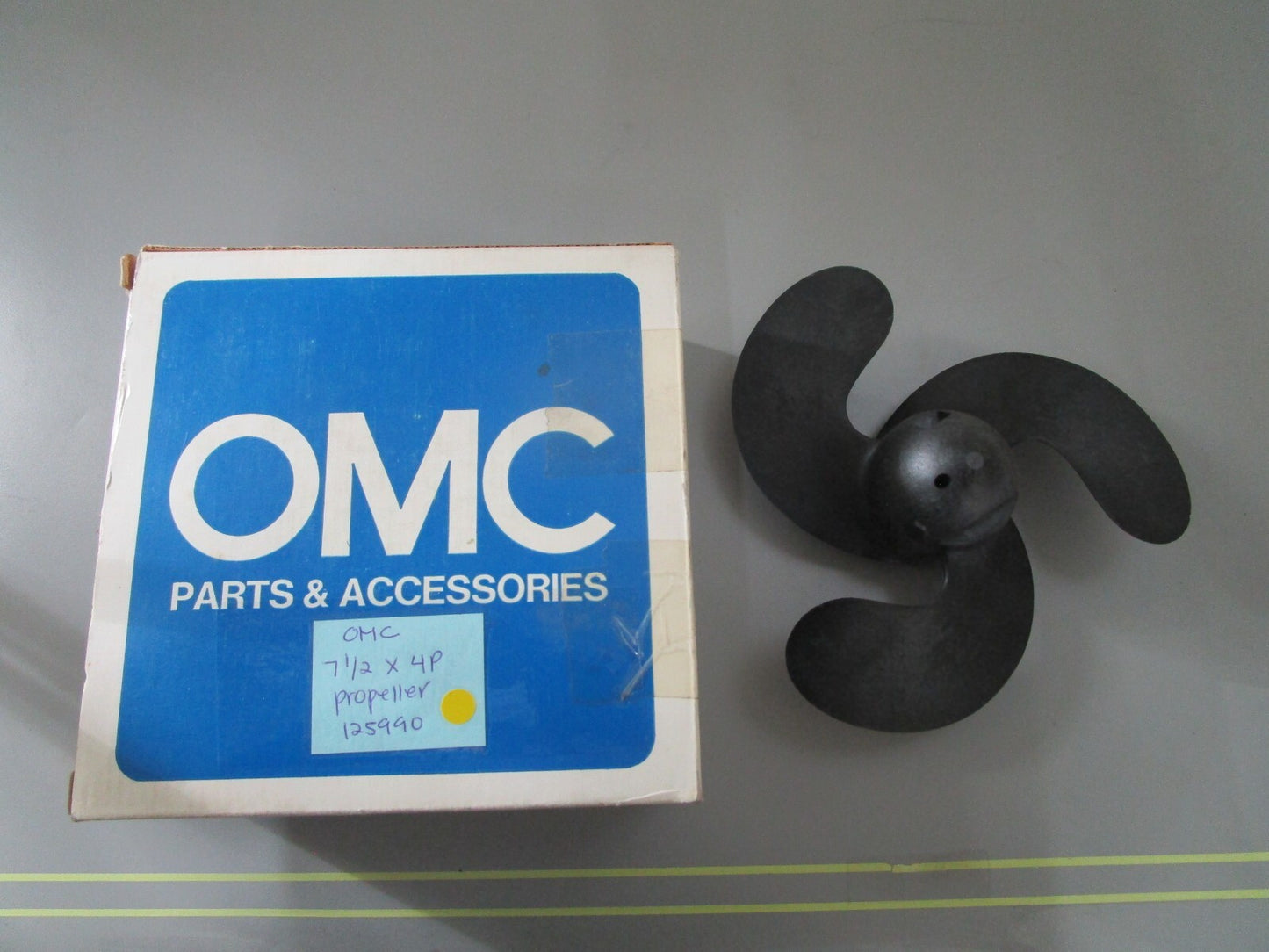 *NEW OEM* 0810 OMC Johnson Evinrude 7 1/2 x 4P Propeller 125990 0125990