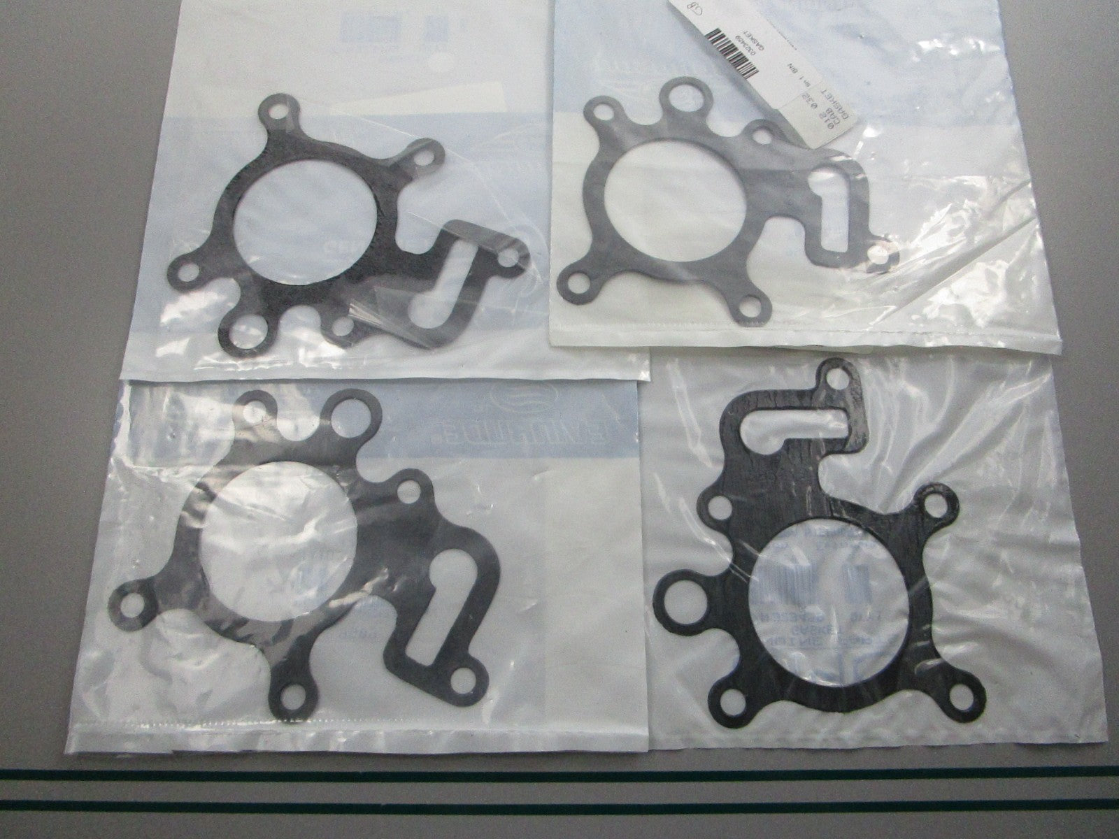 NEW OEM (LOT OF 4) 323459 0323459 OMC Johnson Evinrude Gasket 0810