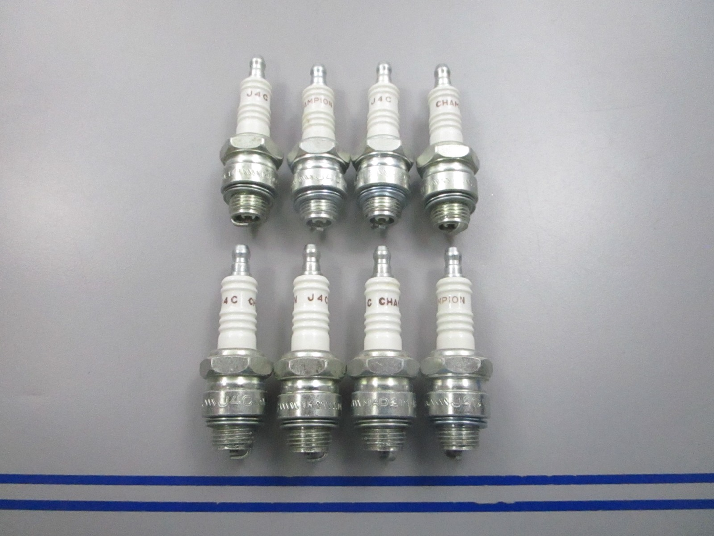 NEW (LOT OF 8) J4C Champion Spark Plug 0810