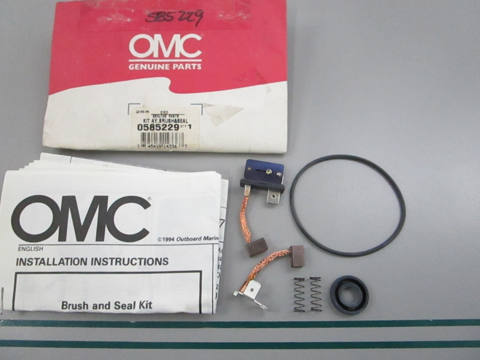 NEW OEM 585229 0585229 OMC Johnson Evinrude Brush & Seal Kit Assembly 0810