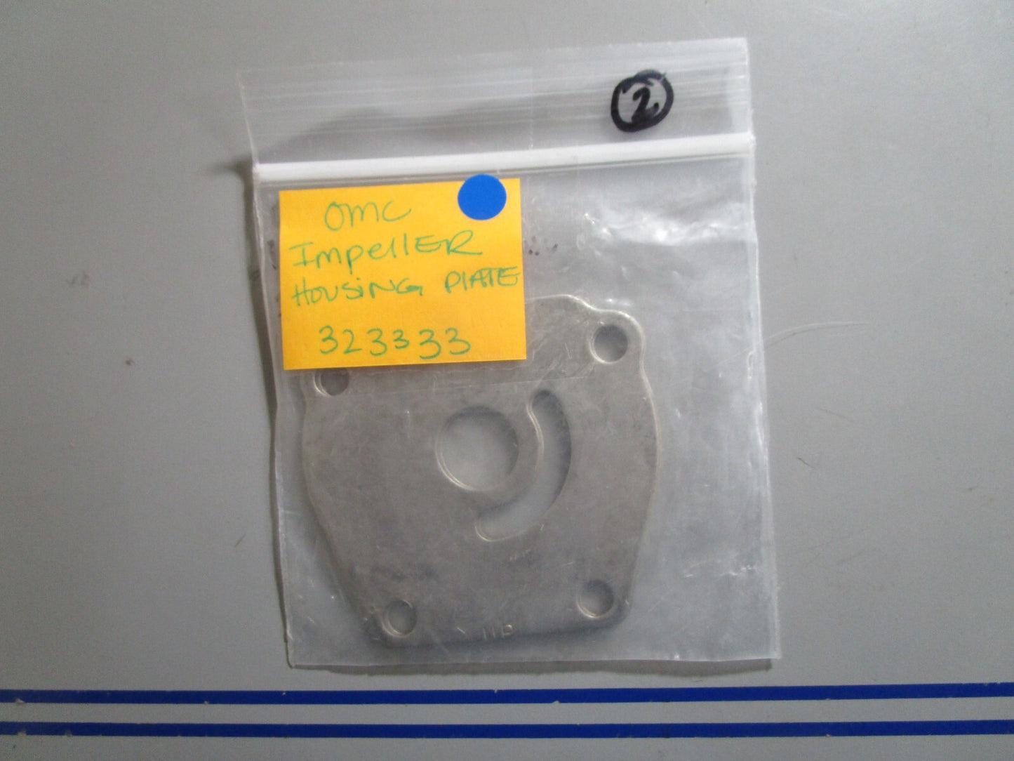 *NEW OEM* 0810 OMC Johnson Evinrude Impeller Housing Plate 323333 0323333