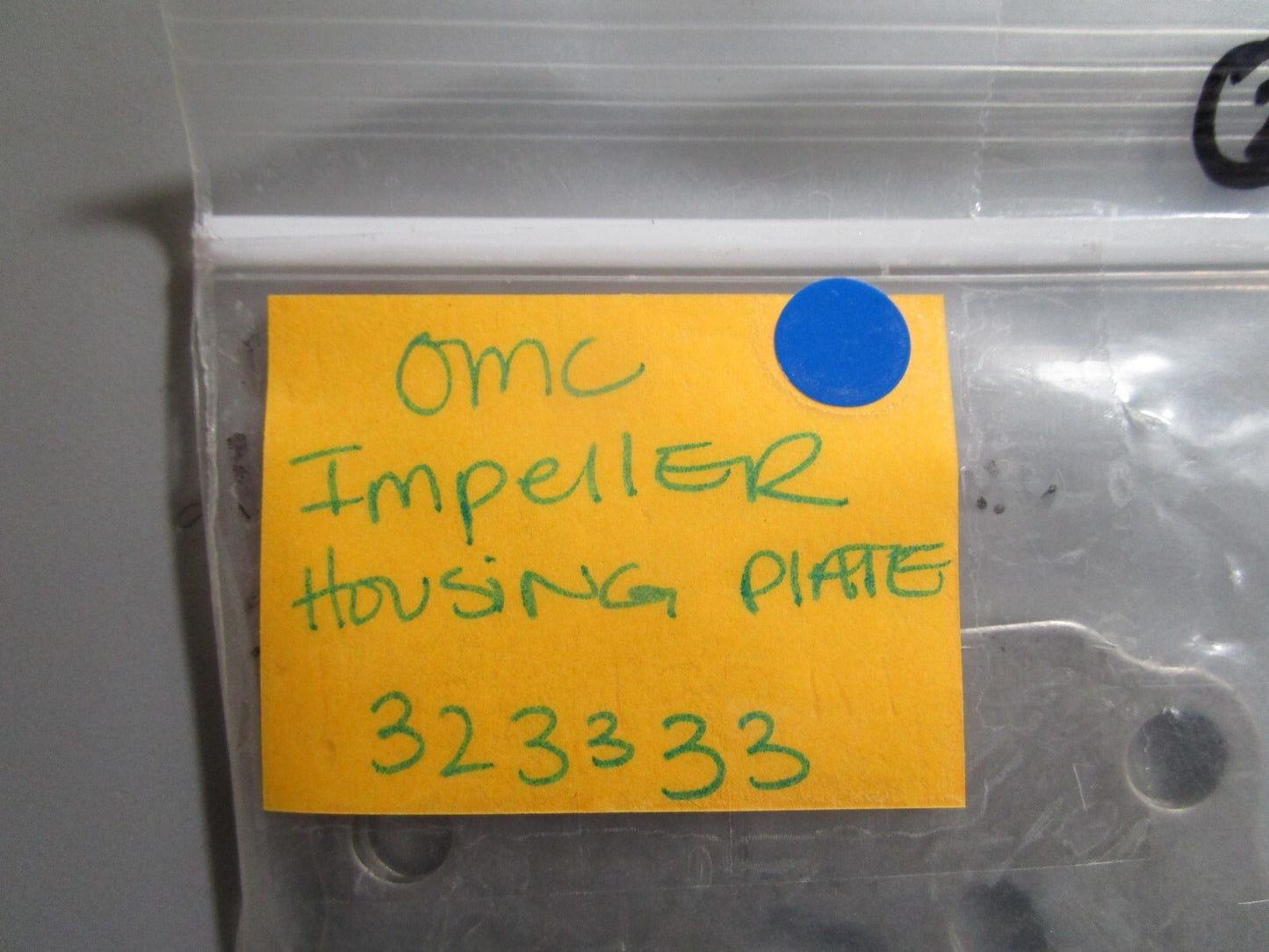 *NEW OEM* 0810 OMC Johnson Evinrude Impeller Housing Plate 323333 0323333