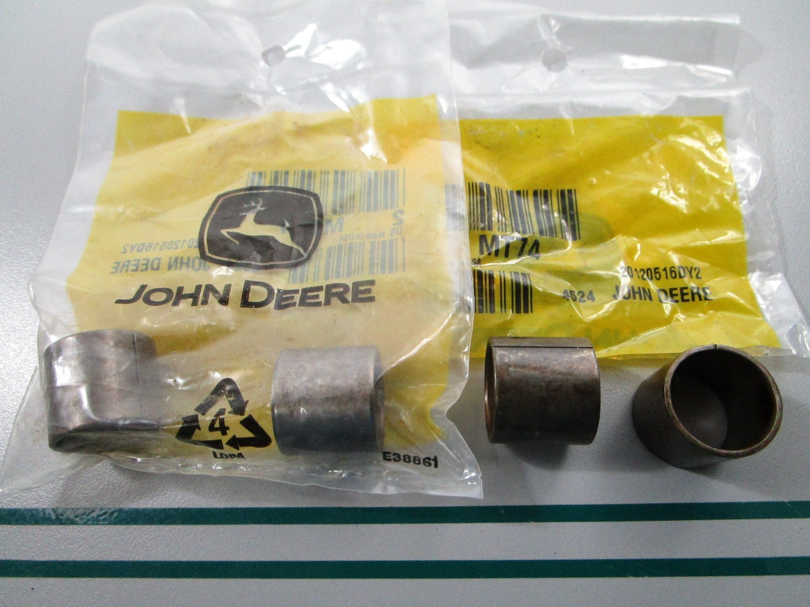 NEW OEM (LOT OF 2) MT74 John Deere 2 Bushing Set 0810