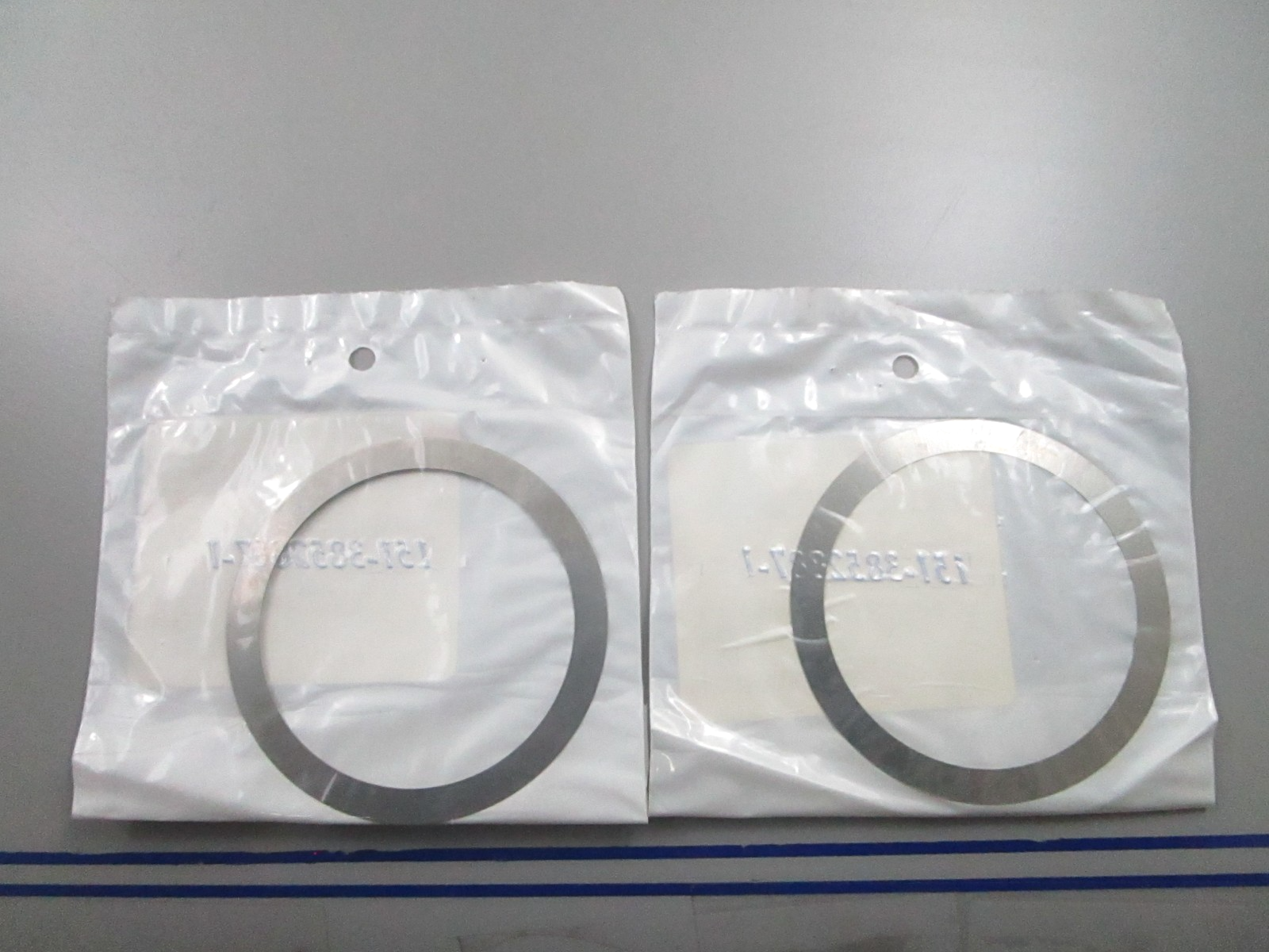 *NEW OEM* (LOT OF 2) 0810 OMC Johnson Evinrude .005 Shim 913872 0913872