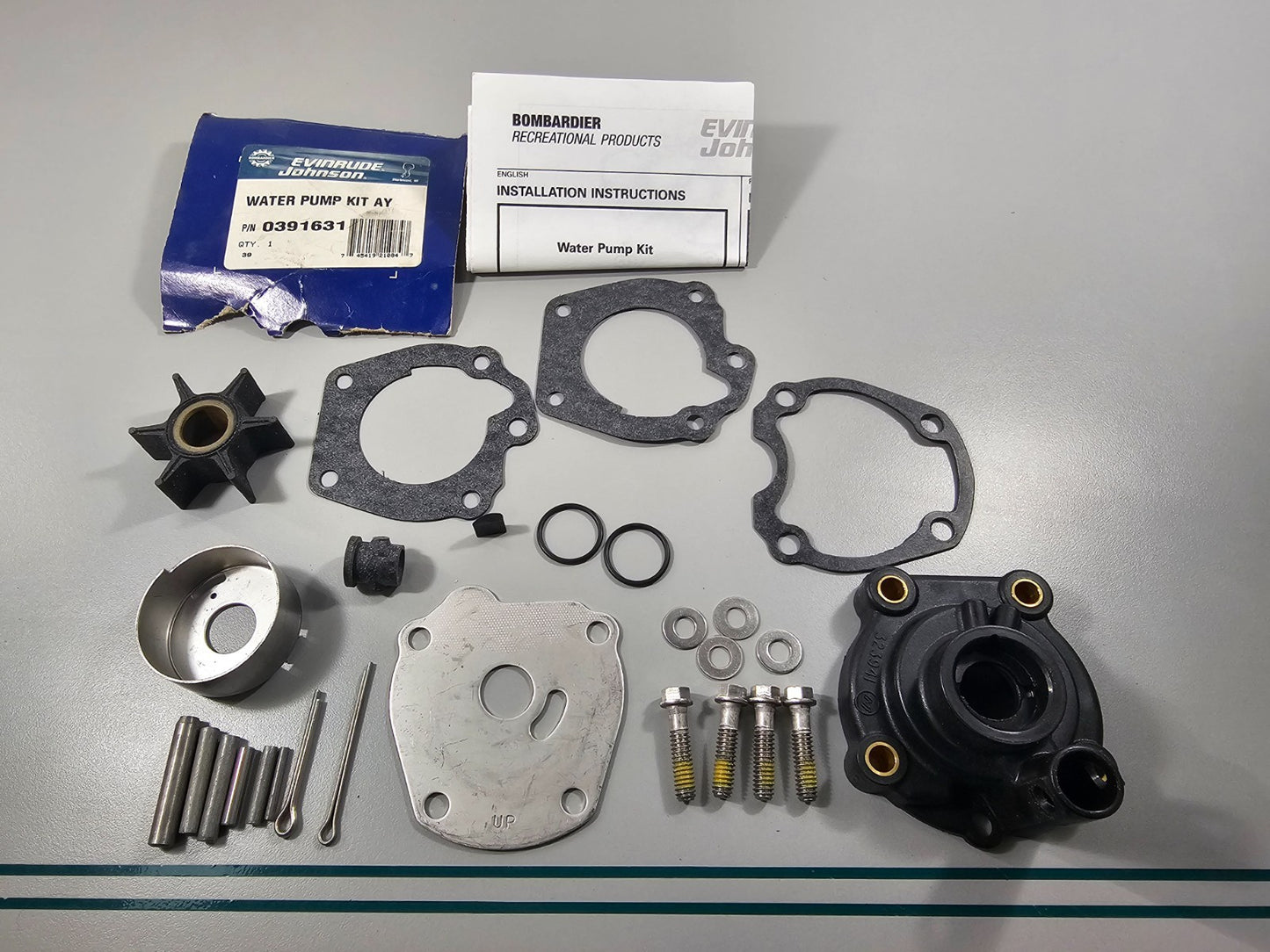 NEW OEM 391631 0391631 OMC Johnson Evinrude Water Pump Kit Assembly 0810