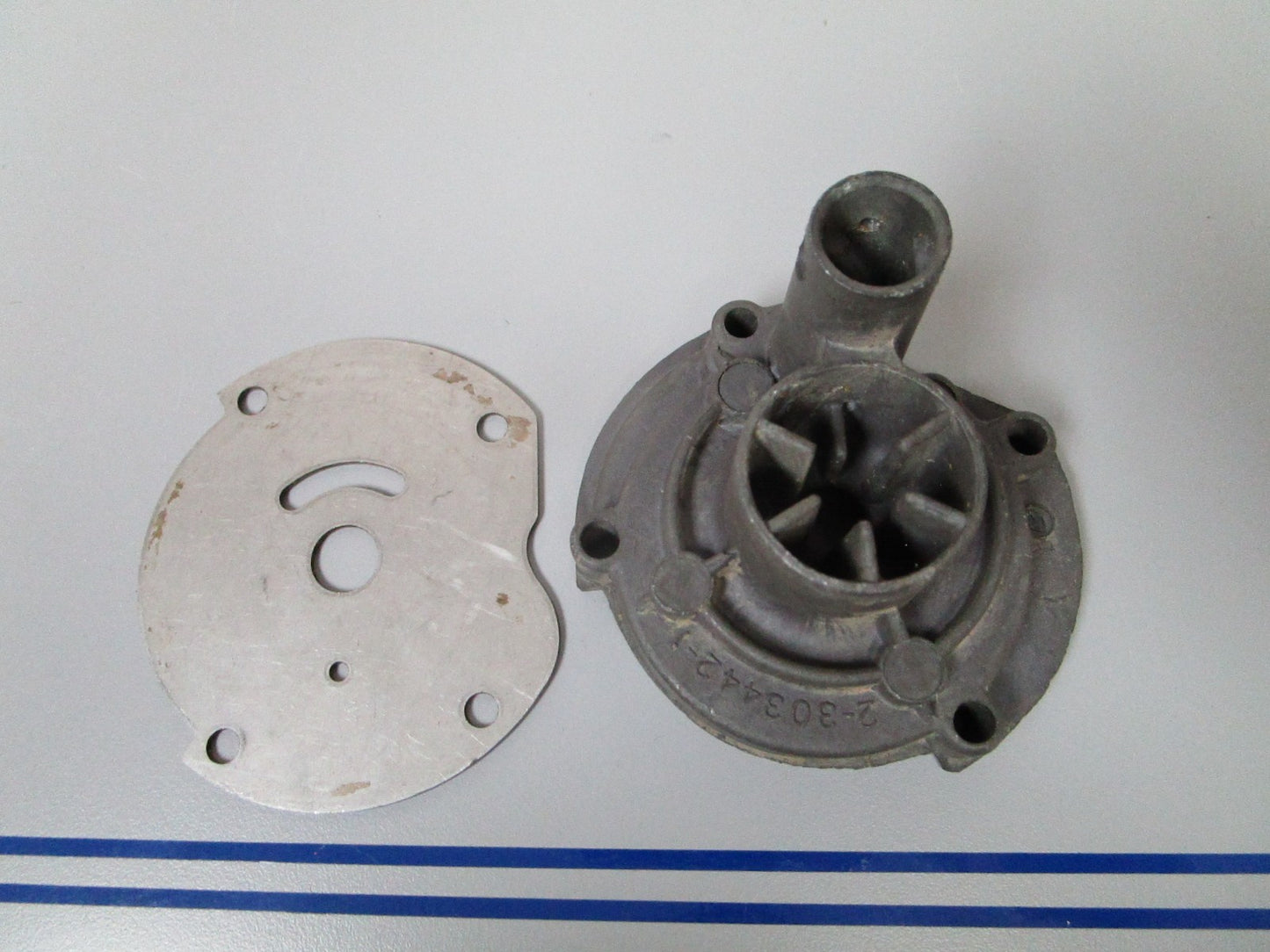 NEW OEM 303442 0303442 OMC Johnson Evinrude Impeller Housing & Plate 0720