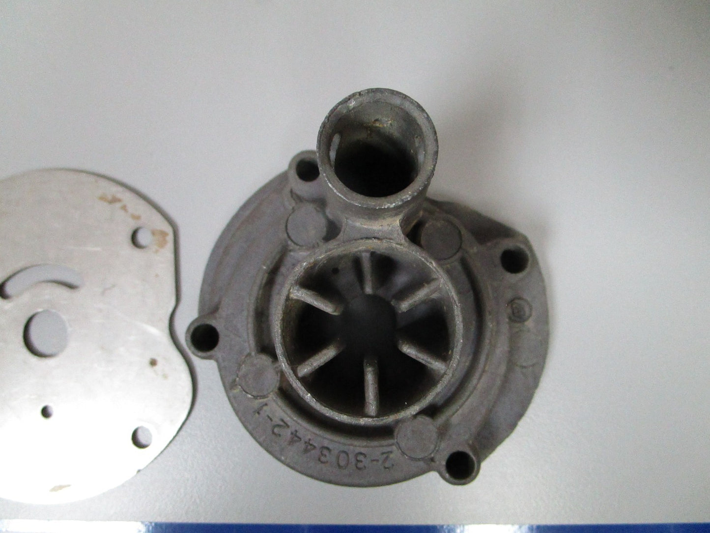 NEW OEM 303442 0303442 OMC Johnson Evinrude Impeller Housing & Plate 0720