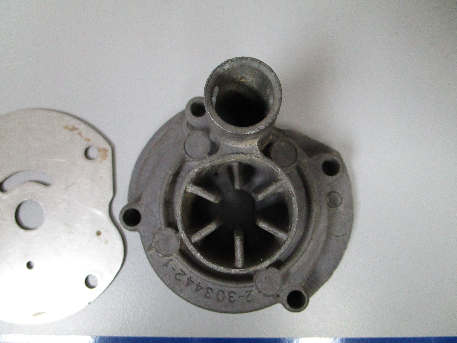 NEW OEM 303442 0303442 OMC Johnson Evinrude Impeller Housing & Plate 0720