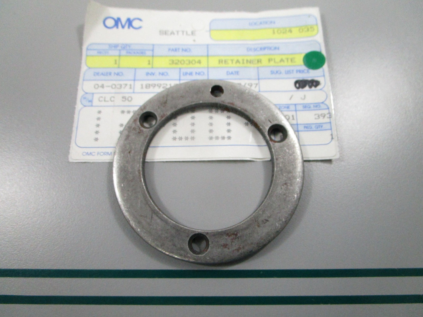 NEW OEM 320304 0320304 OMC Johnson Evinrude Retainer Plate 0810