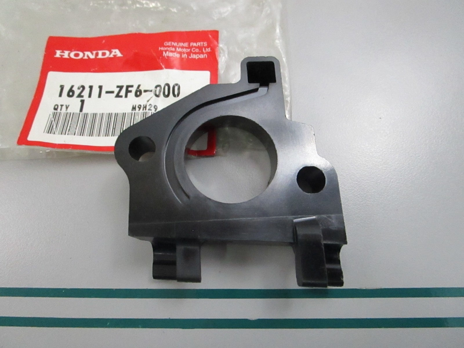 NEW OEM 16211-ZF6-000 Honda Insulator 0810