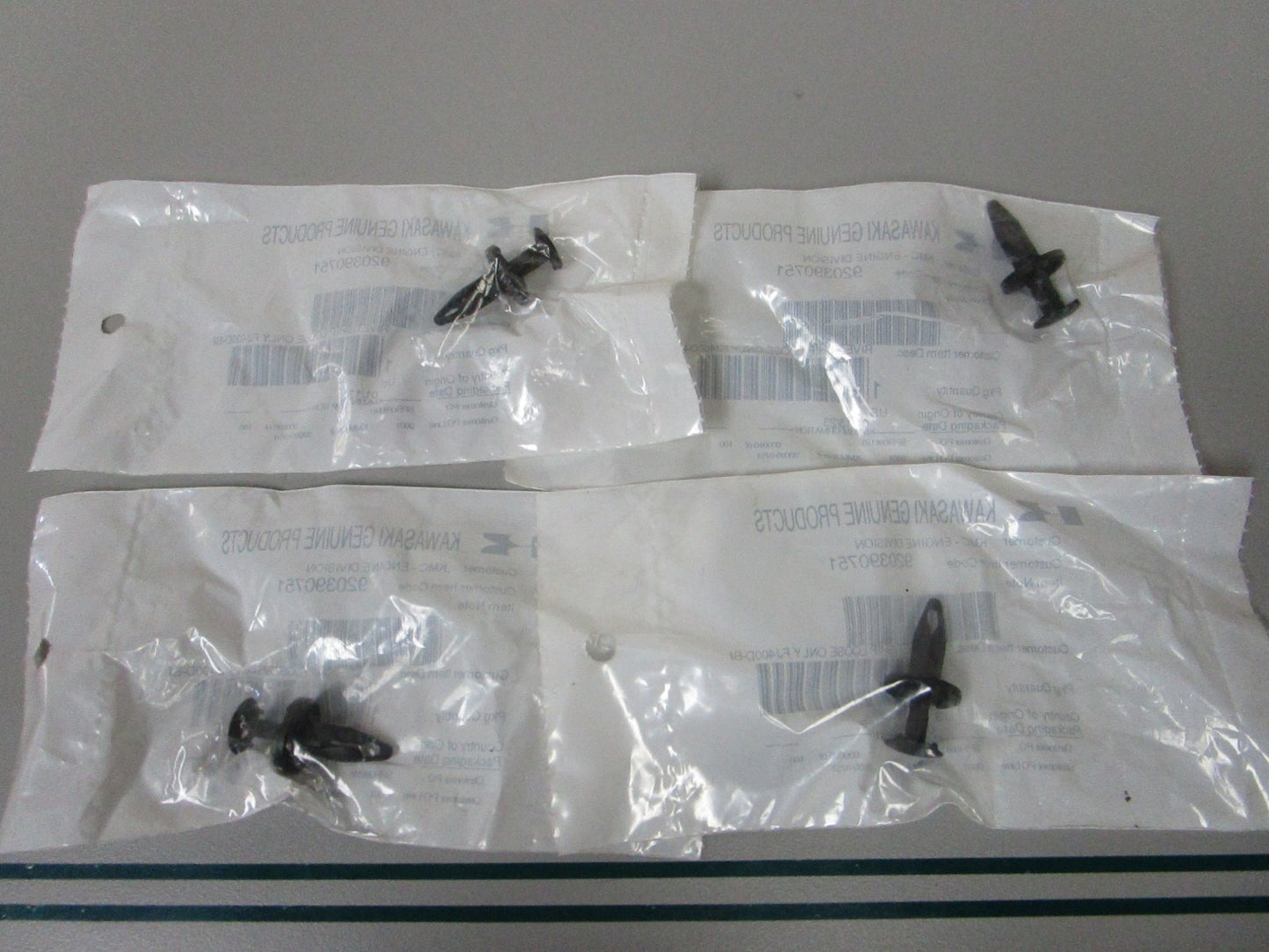NEW OEM (LOT OF 4) 920390751 Kawasaki Rivet Guard 0810