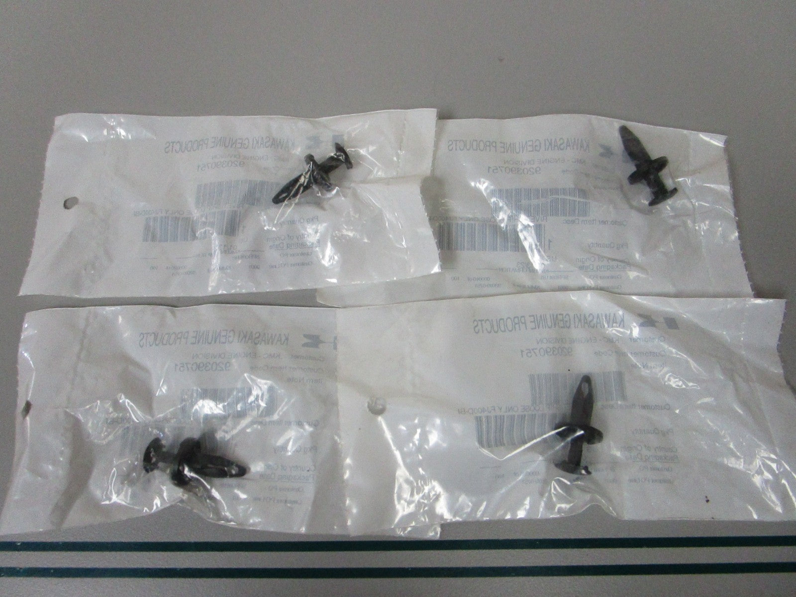 NEW OEM (LOT OF 4) 920390751 Kawasaki Rivet Guard 0810