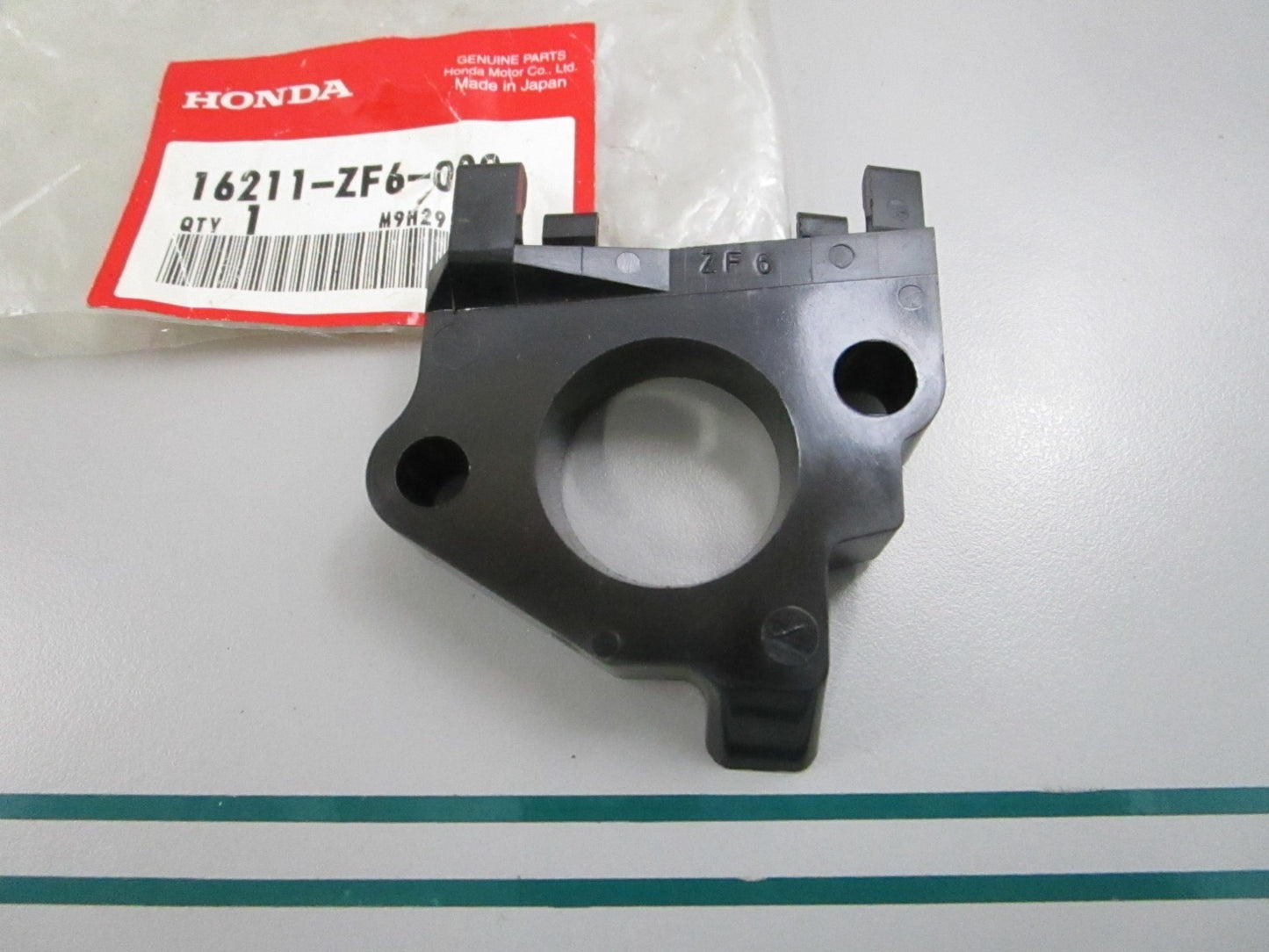 NEW OEM 16211-ZF6-000 Honda Insulator 0810