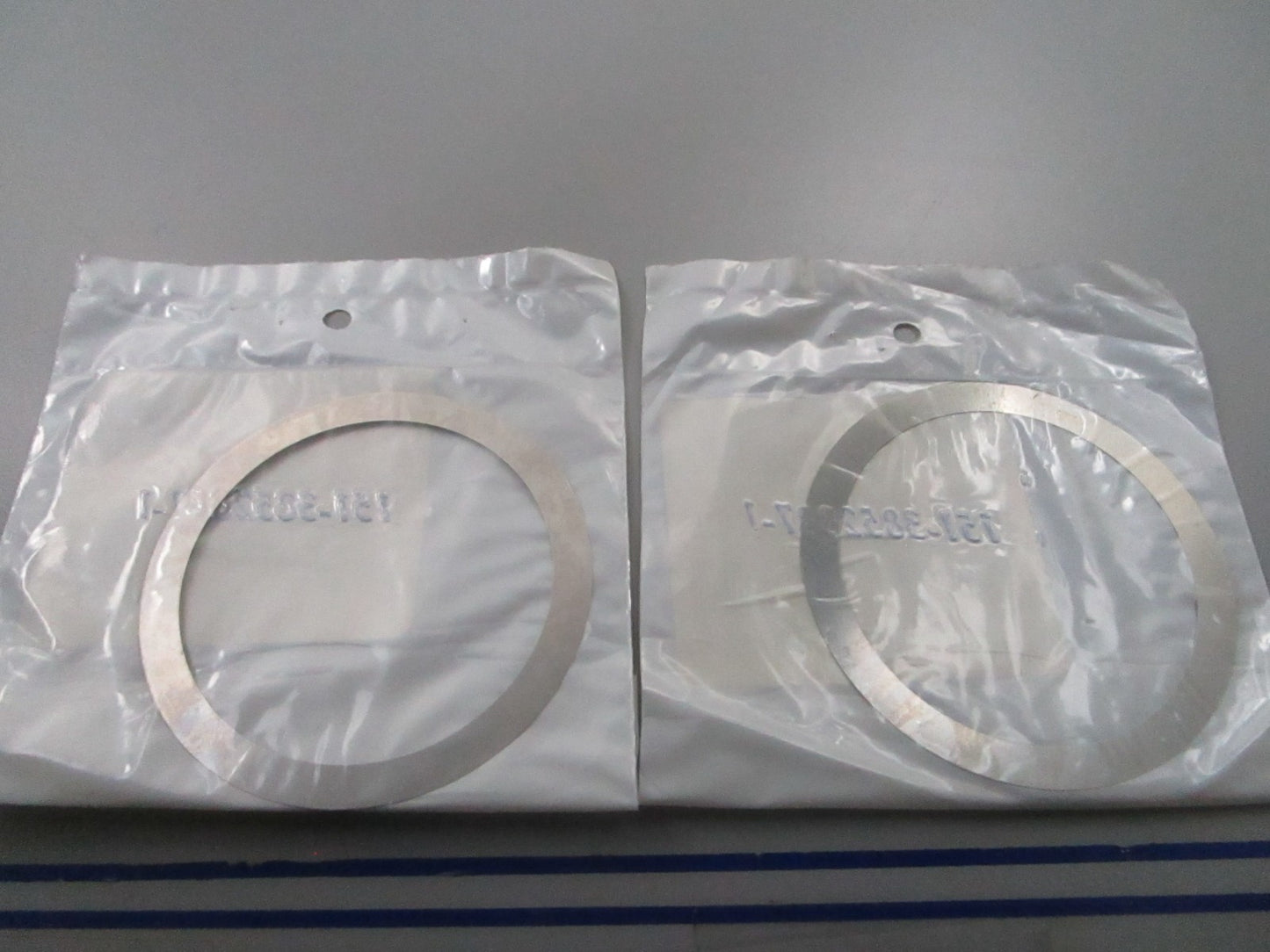 *NEW OEM* (LOT OF 2) 0810 OMC Johnson Evinrude .005 Shim 913872 0913872