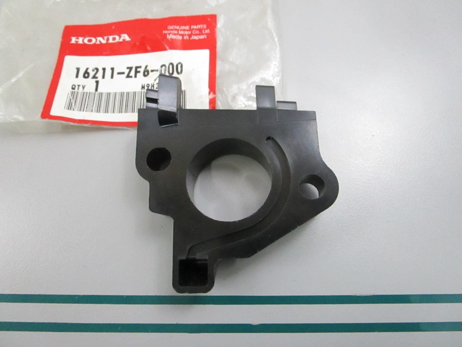 NEW OEM 16211-ZF6-000 Honda Insulator 0810