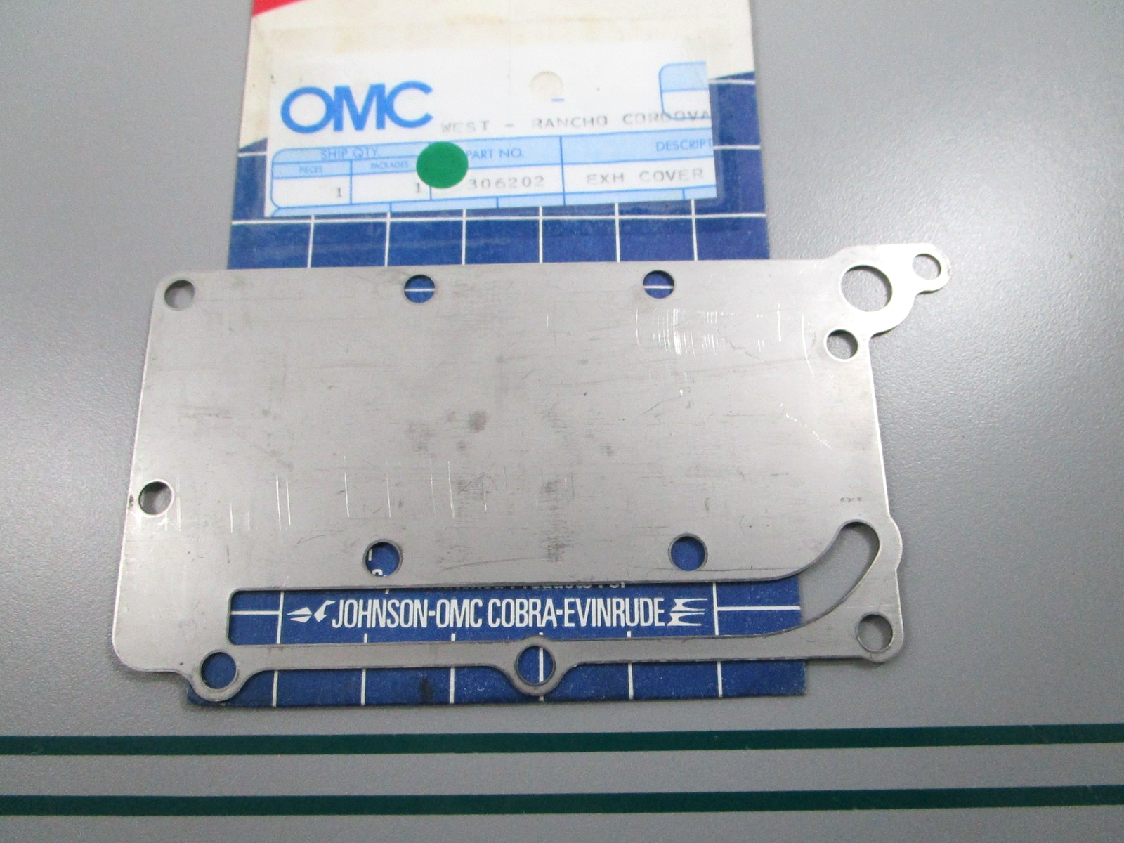 NEW OEM 306202 0306202 OMC Johnson Evinrude Exhaust Cover 0810
