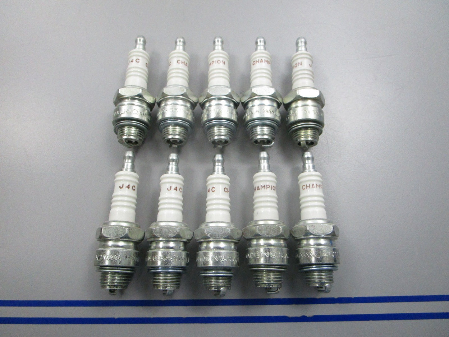 NEW (LOT OF 10) J4C Champion Spark Plug 0810