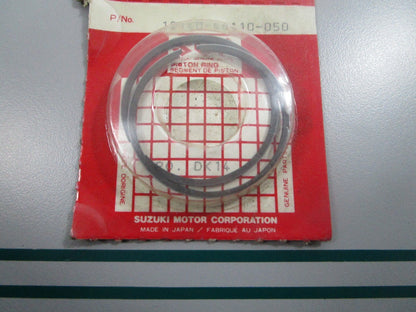 NEW OEM 12140-46110-050 Suzuki Piston Ring Set 0810