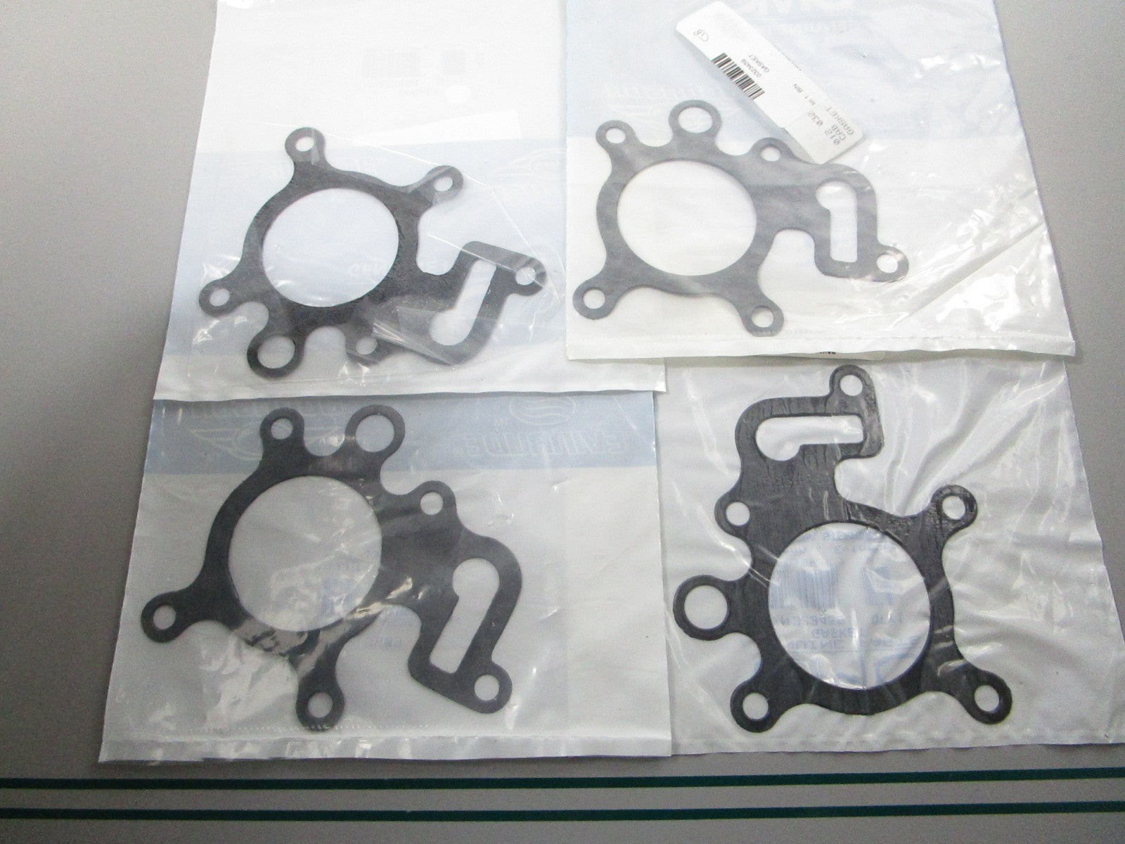 NEW OEM (LOT OF 4) 323459 0323459 OMC Johnson Evinrude Gasket 0810